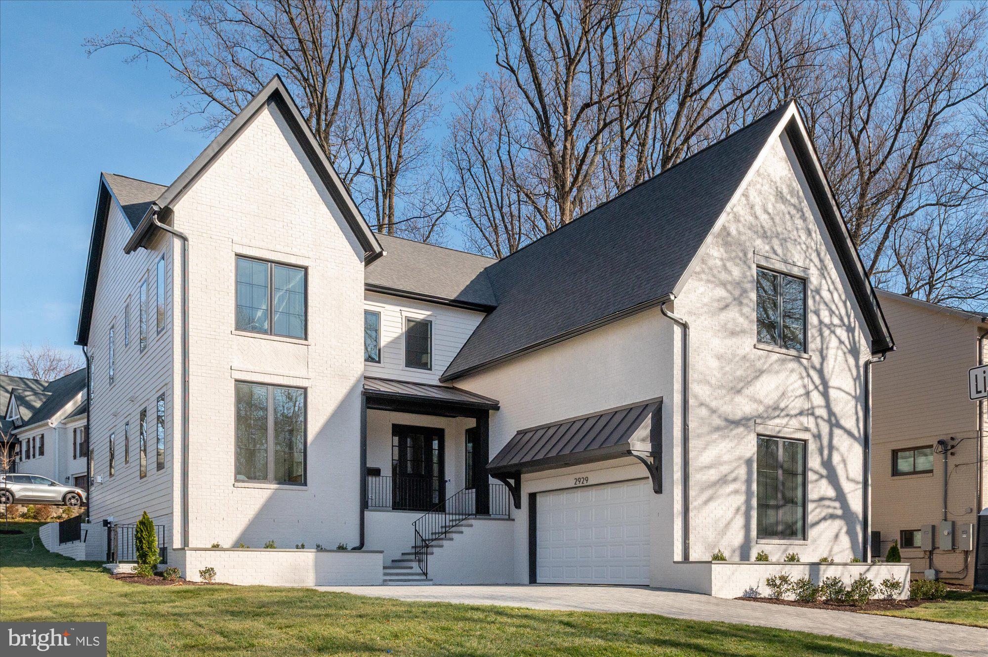 Cherry Hill Custom Homes presents this beautiful new construction home in a super-convenient North Arlington location. This home features 6 bedrooms, 6 full bathrooms, and two powder rooms with 7,030 square feet of finished living space over three levels. The main level includes 10ft ceilings, gorgeous wide-plank engineered white oak wood floors, a beautiful gourmet kitchen with frame-less custom cabinetry and quartz countertops and a rear prep kitchen and pantry. The kitchen overlooks a spacious great room with coffered ceiling and gas fireplace with tile surround and a large dining area and butler's pantry surrounded by windows offering abundant natural light. The bluestone patio off of the great room provides an amazing outdoor living space overlooking the backyard. A guest suite, private study, and mudroom with built-in cubbies complete the main level living spaces. The upper level is highlighted by a luxurious primary suite with spacious dual walk-in closets with built-ins, a spa-like bathroom with heated floors, double vanities, stand-alone soaking tub, and heavy glass enclosed shower. The lower level includes a recreation room with wet bar, golf simulator space, exercise room, an additional en-suite bedroom, and a separate powder room.  Convenient to Lee Harrison Shopping Center, Chestnut Hills Park, Knights of Columbus, Washington Golf, and much more. Discovery ES/ Williamsburg MS/ Yorktown HS.