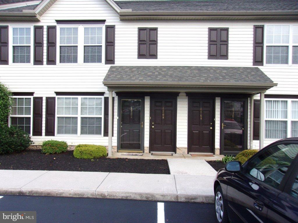 Well kept, upper level, one story condo in Buttonwood Greens. Entrance foyer leads to Living Room, Dining area, Kitchen and Half Bath. Decor is neutral and move-in condition. The large Master Bedroom has a walk-in closet and separate door to the half bath. The other Bedroom has a door to the deck. There is a separate Laundry Room. The Refrigerator and HVAC are new. The roof has been replaced, and parking areas have been repaved. The exterior is beautifully maintained by the Condo Association. Original builder information is in the Associated Docs. Zero down USDA Mortgage Financing.