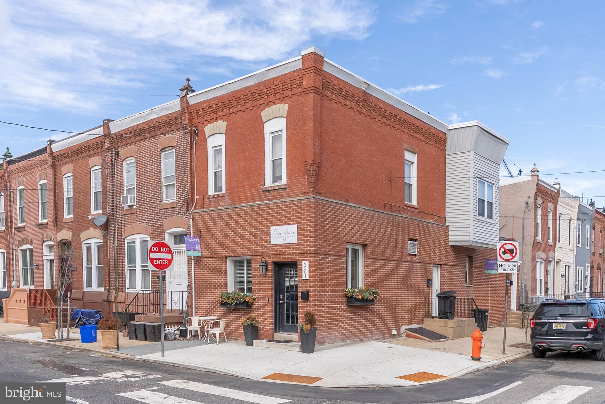 Prime corner mixed-use property offering both stable income and clear value-add upside in one of Philadelphia’s most desirable neighborhoods. The building consists of three separately metered units: a renovated commercial space and two residential apartments.

Unit 1F – Commercial: Updated corner storefront currently leased for $1,250/month, delivering steady cash flow from day one.

Unit 1R – Residential: Recently rented one-bedroom at $1,050/month, presenting a turnkey opportunity for cosmetic upgrades or repositioning to boost returns.

Unit 2 – Residential: Renovated two-bedroom apartment leased at $2,180/month, featuring Hazelwood cabinetry, tile flooring, a modern bathroom, and in-unit laundry.

Located just one block from Naval Square and minutes from the South Street Bridge, CHOP, UPenn, and Rittenhouse Square, the property is positioned within a 95 Walk Score corridor known for strong rental demand and continued appreciation.

An ideal value-add investment: generate immediate income while elevating the remaining residential unit to drive NOI growth and long-term equity.
