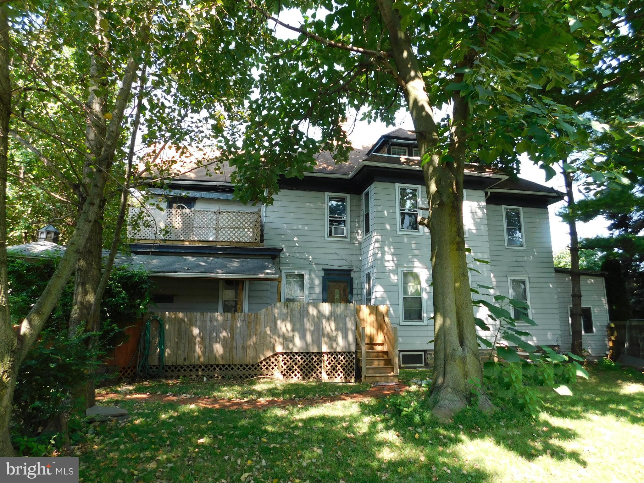 This Victorian home in Paradise features a large family room with fireplace, hardwood floors, mature trees for shade and privacy, five bedrooms (6 counting Carriage house), covered porch and finished basement with kitchen. The property is perfect for in law quarters and also an in home business. Rental income a possibility as well. A quiet family neighborhood with many amenities including good schools. Just across the street is the large Paradise township park with public tennis and basketball courts, playgrounds, picnic pavilions, walking trails and playing fields. Nearby is the  American Music Theater with Nationally known performers and acts within 4 miles as well as many nationally known outlet stores. People come from as far away as New York to be entertained and shop here. The carriage house has a 800+ square foot finished space appropriate for an office or in law quarters. This is a lot of property for the money.