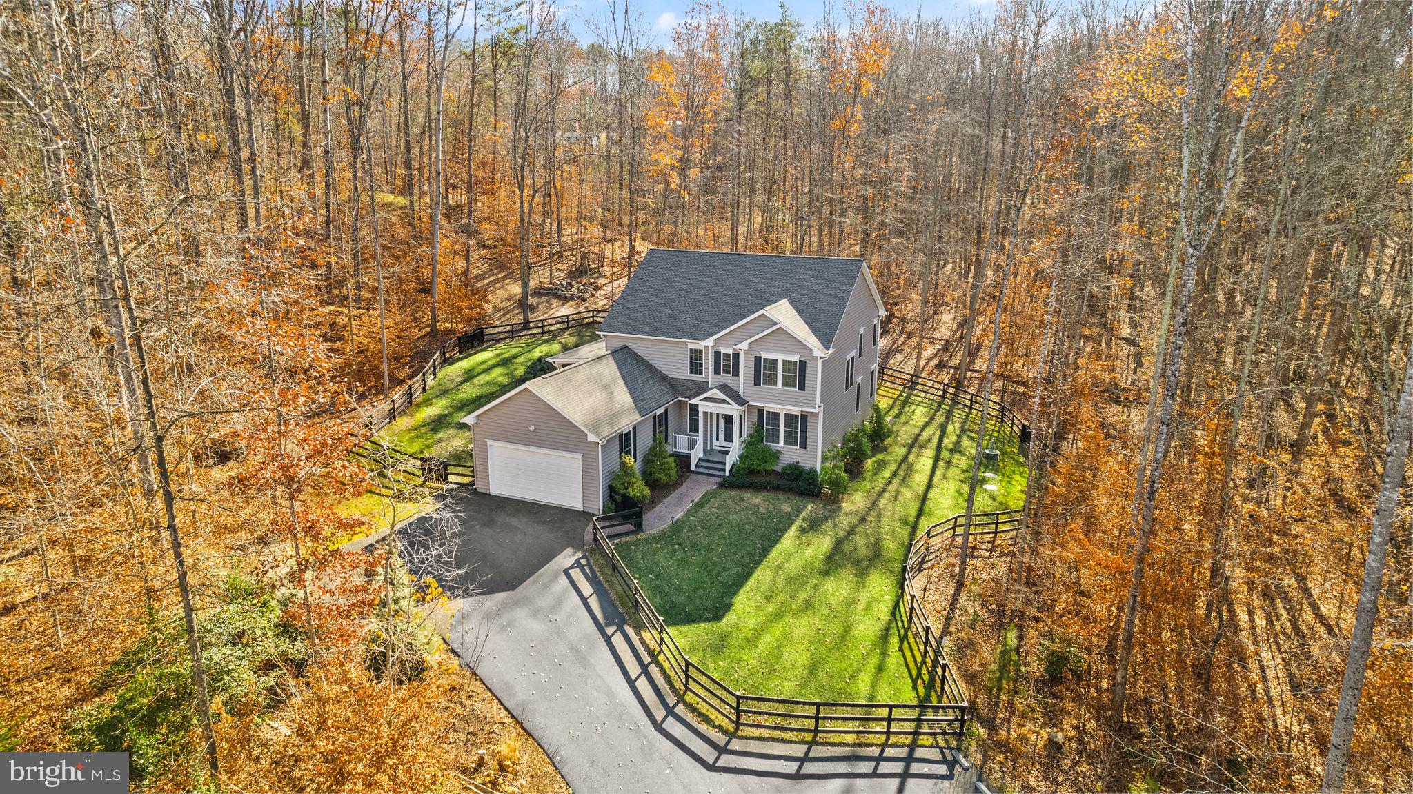 ABSOLUTELY GORGEOUS, GORGEOUS home in Nokesville!! Situated on 2.41 acres at the end of a cul-de-sac featuring  4 bedrooms with 4 full bathrooms  and 2 half bathrooms.  This home is BEAUTIFUL and METICULOUSLY maintained!  Stunning flooring throughout, a HUGE kitchen island for entertaining and a covered patio that is private and incredibly peaceful!! Custom built  in 2019, this home shines with high end upgrades and a modern feel throughout. Recent upgrades include custom paint, relaxing covered patio and fenced in yard.  Come fall in love with this GEM!!