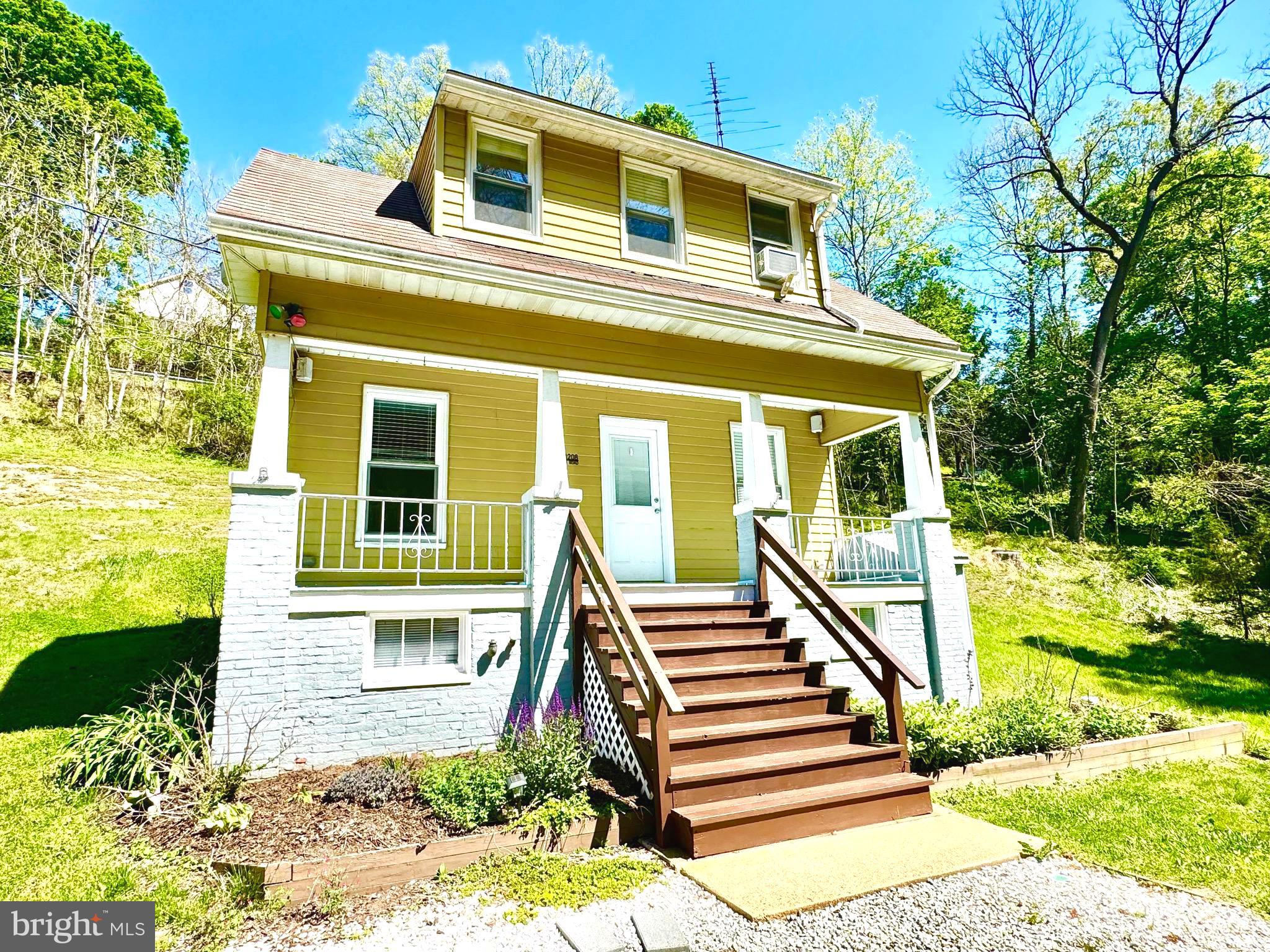 GREAT PRICE IMPROVEMENT !! Nestled in the charming countryside of the Hereford Zone, this delightful Cape Cod, exudes warmth and character with a nice relaxing front porch.  This home features two cozy bedrooms with built-ins and large closet space + reading nook bonus room.   Step inside to discover a traditional floor plan that seamlessly combines the dining and living areas, enhanced by rustic wood floors. The full bathroom is conveniently located on the main floor. The galley kitchen, complete with a nice size pantry, awaits your personal touches for culinary creativity, while the ceiling fans and double-pane windows ensure a comfortable atmosphere year-round. The partially finished basement offers additional space for hobbies or storage along with the laundry area & 1/2 bath.  Enjoy the outdoors on your private deck, ideal for morning coffee or evening gatherings, surrounded by lush landscaping on a generous 0.73-acre lot. Exterior highlights include secure storage and off-street parking. This home is not just a place to live; it’s a sanctuary where memories are made. With its blend of classic charm and cozy comforts, this property is ready to welcome you home. Don’t miss the opportunity to make it yours!  Why Rent When You Can Buy!!! Close to HEREFORD ZONE SCHOOLS!