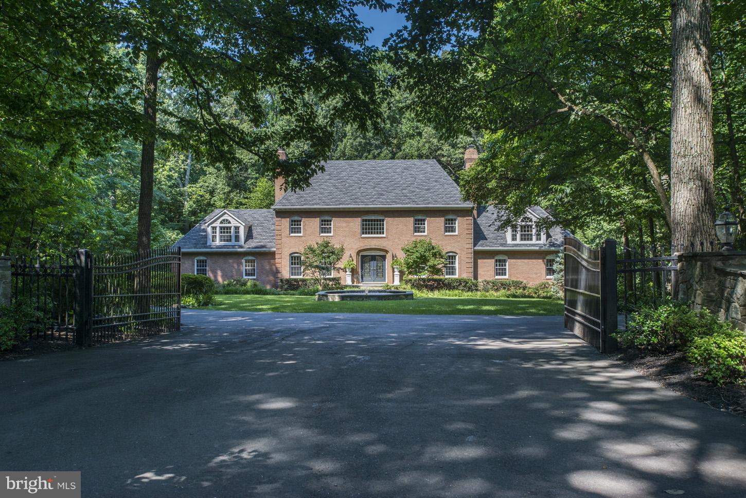 Gated, fully-fenced, 4 level Georgian Colonial on nearly 3 acres from quiet private road with over $300k in renovations.  New gourmet Kitchen off Great Rm & Mudroom. Luxurious Master Suite w/FP, balcony, new bath, 2-person shower & large dressing room w/2nd W/D. Fully finished lower level, Resort-like backyard w/pool, two spas, large deck, gazebo & expansive lawn. 4 car garages.