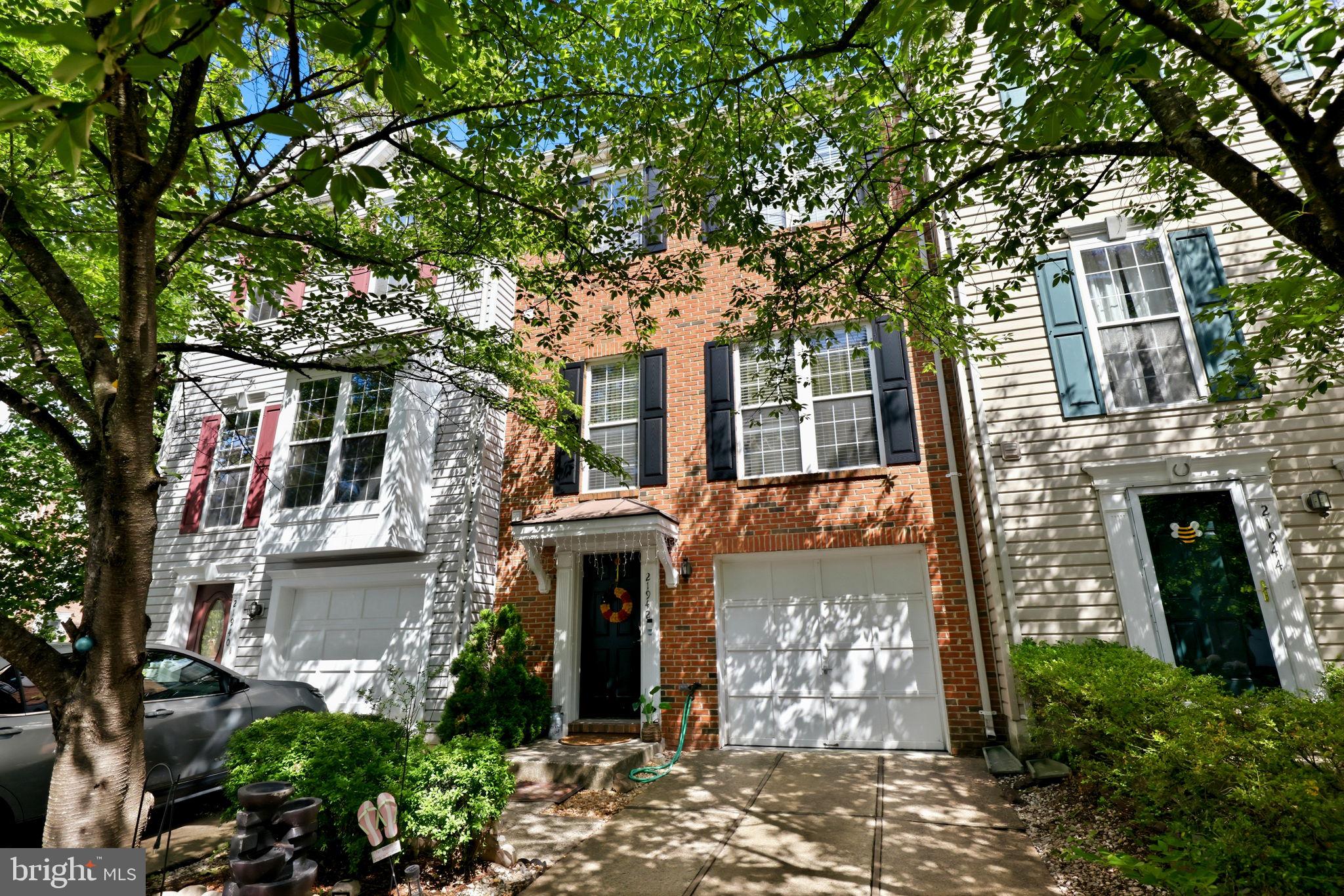 LOCATION, LOCATION,LOCATION, Welcome home to this move-in ready, brick-front townhouse in the highly desirable Dominion Station community! This bright and spacious 3-bedroom, 4-bathroom home features stunning hardwood floors flowing throughout the entire main level. The kitchen comes fully equipped with sleek stainless steel appliances and seamlessly connects to a large, elevated deck—perfect for outdoor dining and entertaining. Enjoy a fully finished, walk-out ground-level basement that leads directly into your private, fenced-in backyard. Complete with an attached 1-car garage and a premier location just minutes from Route 28, Route 7, Dulles Town Center, and Dulles International Airport, this home offers the perfect blend of comfort and convenience. Schedule your tour today before it's gone!