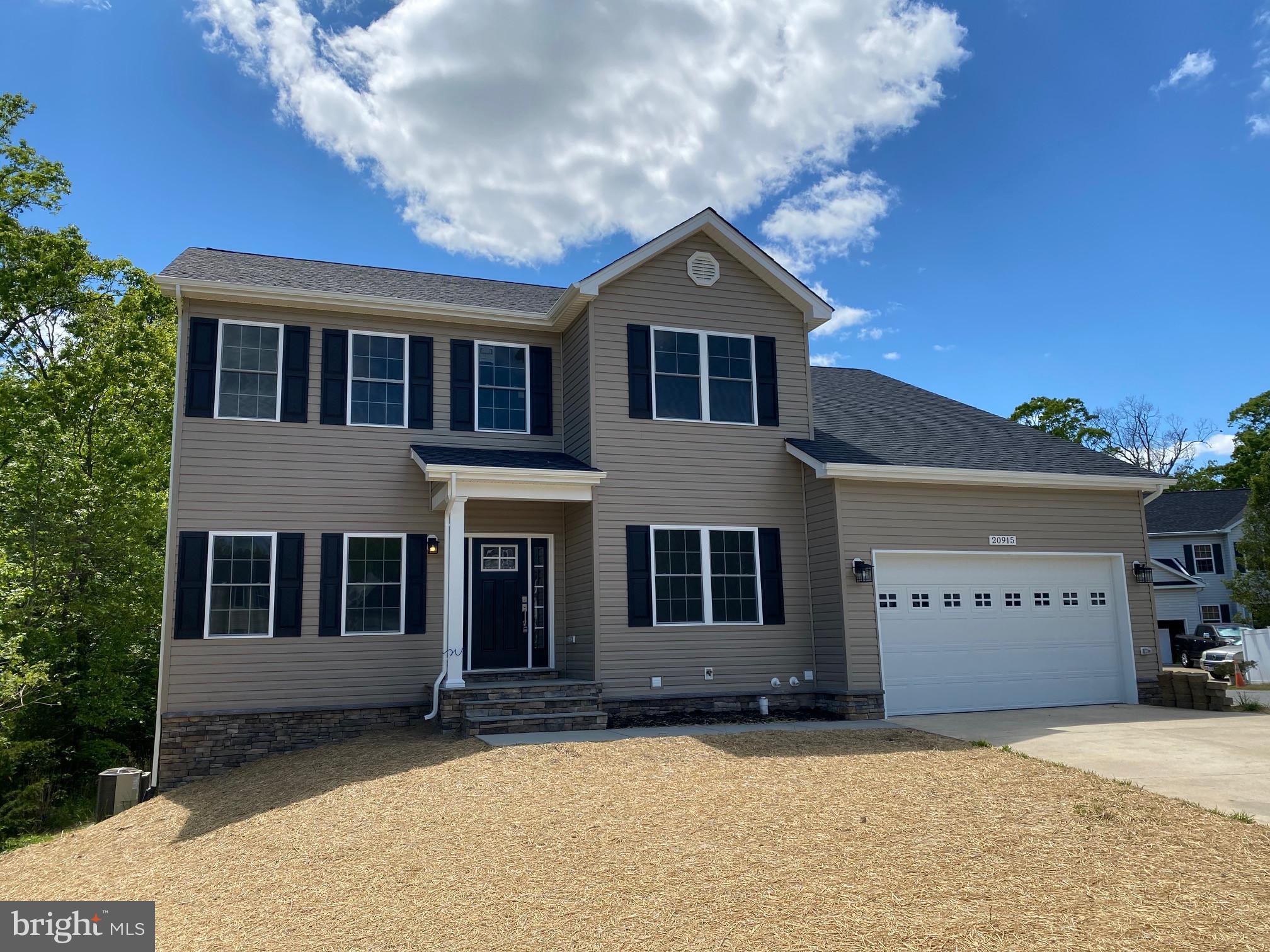 Beautiful home being built.  Unfinished basement.   Separate den on first level.  Upgrades include granite counters, tile showers, wood floors on main level, SS appliances, lighting, etc.