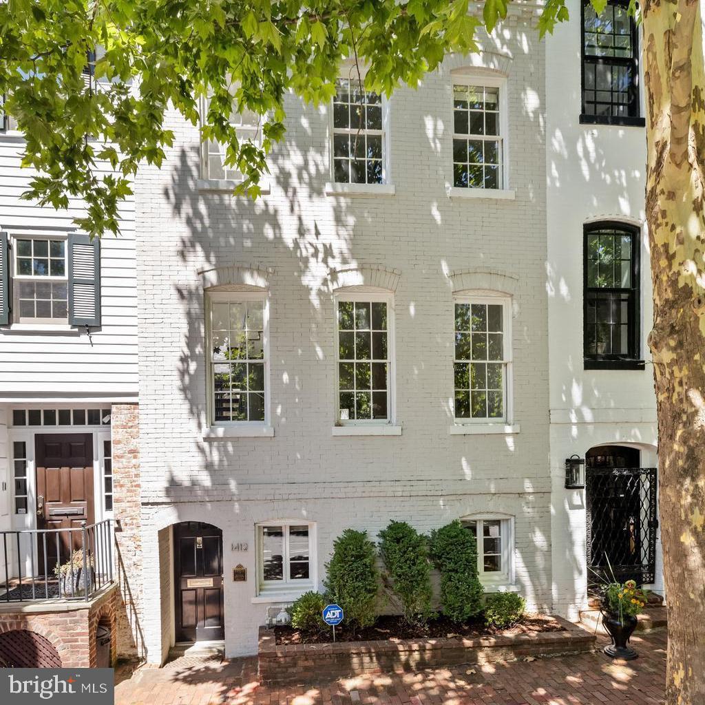 1412 34th Street, NW is a very rare combination of contemporary new construction within the walls of a traditional 19th century Georgetown House and was recently completed with the finest materials and workmanship. Located in a tree-lined residential area, the house is only steps to Volta Park with its pool, tennis courts, playground and green space, and just blocks to fine shopping and dining of Georgetown. It is no wonder that some of Georgetown’s most distinguished residents and finest houses surround the property.

The singular design of this property combines light and soaring spaces to create a stylish and comfortable residence. The house is flooded with light through its many windows and skylights and its large private terrace and garden are visible from all points of the main level. The living space is inspiring and highly functional with top-of-the-line appliances and fixtures, and a floor plan with good flow making it a wonderful entertaining space for any size gathering.

The entire top floor is a master suite with magnificent with luxurious spaces, views, and conveniences. There is also a private area with a guest suite and library or home office on the entry level