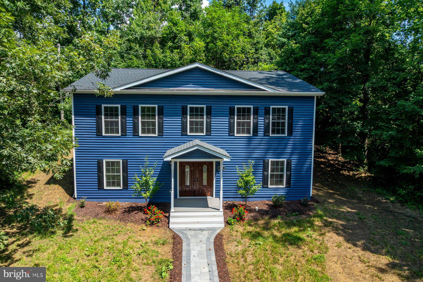 This home offers a flexible layout paired with contemporary finishes. The entry level features a half bath and laundry area. Upstairs, the kitchen with stainless steel appliances opens to the dining and living areas, creating an easy flow for everyday living and entertaining. The upper level includes four rooms currently used as bedrooms, two full baths, including a primary suite with a generous closet and private ensuite bath, plus a convenient desk nook.

Additional features include updated siding, roof, a detached garage, a newly added partial privacy fence, and a county-assisted holding tank pumping program that helps reduce ongoing pumping costs.  Added Value: This property is currently enrolled in the county assisted holding tank pumping program. Under the current program, the owner's annual pumping costs average approximately $150 - $200 per year (with the program), compared to costs that can be substantially higher for many privately maintained systems. Details on the program can be verified with the county.  

Conveniently located near Bacon Ridge Natural Area and downtown Annapolis, with easy access to shopping, dining, and major commuter routes.