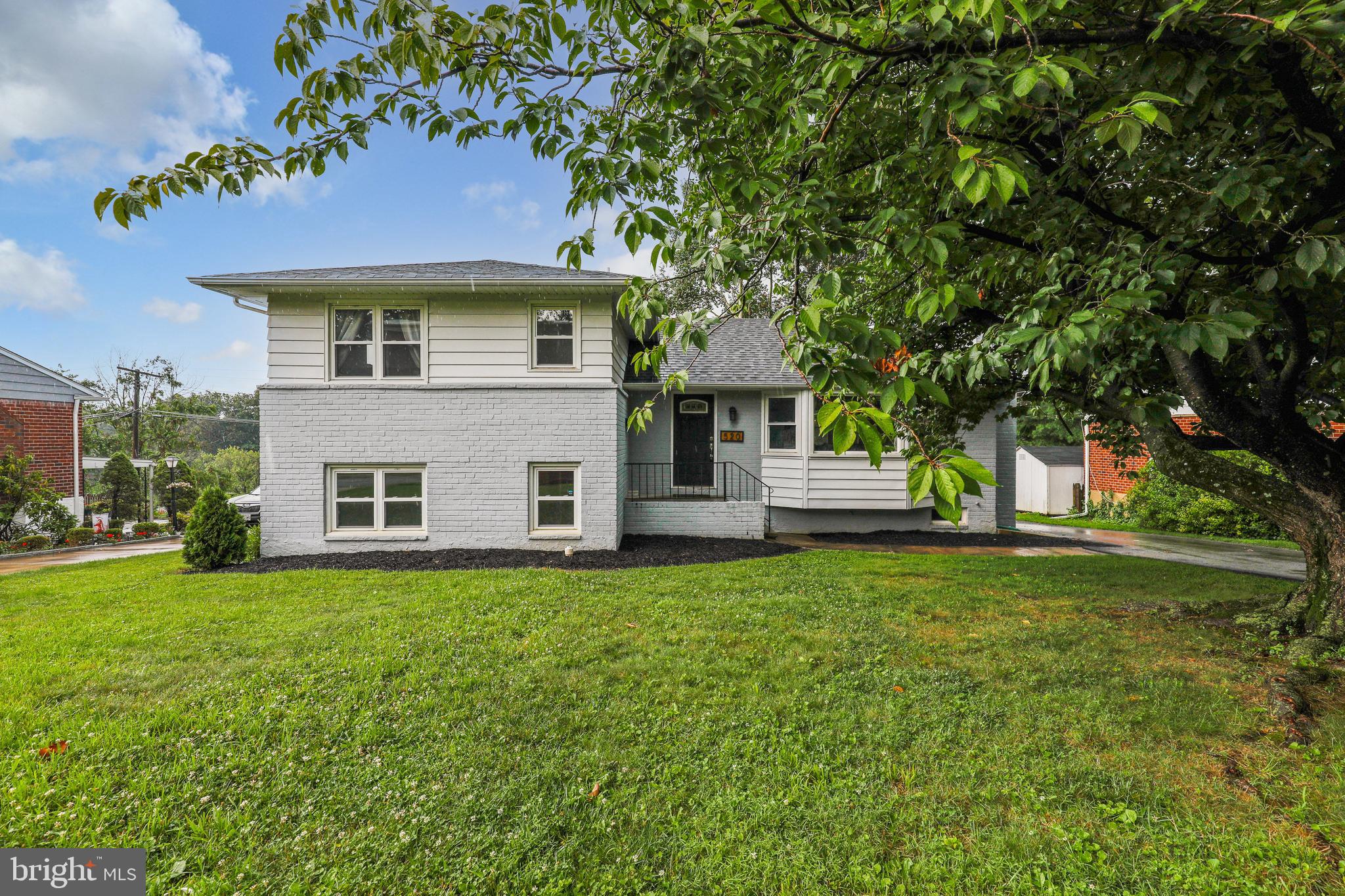4 FINISHED & FULLY UPDATED LEVELS!  2500+ SQ FT IN CAMPUS HILLS!  THE MAIN LEVEL FEATURES GLEAMING HARDWOOD FLOORS, LARGE FAMILY ROOM WITH FIREPLACE & A DELUXE KITCHEN, 42" MAPLE CABINETS, GRANITE COUNTERS & STAINLESS STEEL APPLIANCES.  UPSTAIRS INCLUDES 3 LARGE BEDROOMS WITH 2 FULL BATHROOMS.  THE FIRST OF LOWER LEVELS FEATURES BEAUTIFUL STONE FLOORINGS WITH AN ADDITIONAL LARGE FAMILY ROOM, FULL BATHROOM, AND BEDROOM.  PLUS A FINISHED BASEMENT WITH AMPLE STORAGE.   ENJOY A LARGE BACKYARD WITH STAMPED CONCRETE PATIO.  WELL MAINTAINED IN A+ LOCATION!