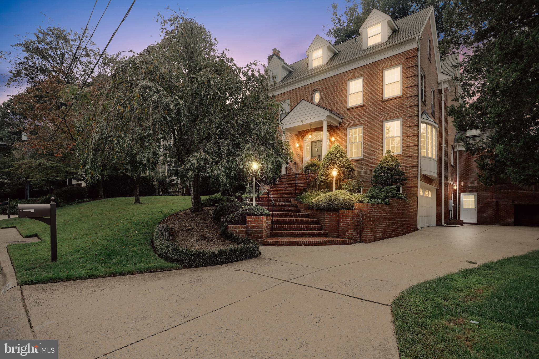 Gorgeous, all brick, custom colonial with uncompromising level of quality craftsmanship in the Whitman/Pyle cluster.  4 fully finished levels, 6 bedrooms, 5 and half baths, and 3 fireplaces provides space for everyone!  As you walk in the door, this true center hall floor plan offers a view through the house to the rear yard. Formal dining, living and family rooms with fireplaces, butlers pantry, eat-in kitchen with high-end cabinetry, huge island, stainless appliances, steam oven,  wine fridge, 6 burner cooktop and sub-zero refrigerator. French doors in the family room open to a fabulous level, fenced in backyard with flagstone patio and southwest exposure.  Upstairs, the Owner Suite features 2 walk-in closets w/custom cabinets, soaking tub, luxury shower system, and two separate vanities. The additional bedrooms, one en suite, each have access to their own adjacent baths and walk-in closet. Third level features three additional bedrooms with full bath. One enormous room has soaring cathedral ceilings and bright sunshine through the skylights making this room a great home office or studio. Fully finished walk-out lower level has a recreation room with a 3rd fireplace and optional bedroom/office /fitness room with full bathroom. 2 car attached garage. WOW!!! You really have to see this one-of-a-kind home and outdoor space.