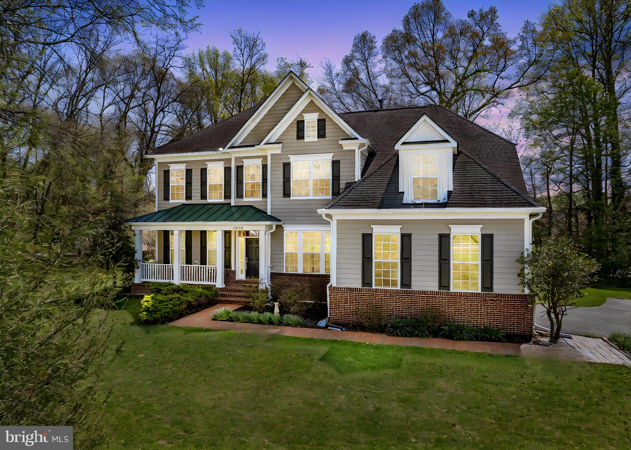 RARE NO-HOA ASHTON ESTATE • 4,600+ SQ FT • SOARING 10-FOOT CEILINGS • LEVEL 0.75-ACRE LOT • 5 BEDROOMS • BRAND-NEW CARPET. Tucked at the end of a private drive and surrounded by mature trees, this custom built Ashton residence offers more than 4,600 sq. ft. of refined living on a beautifully landscaped, level 0.75 acre lot—an elegant retreat with the rare freedom of no HOA. Inside, soaring 10 foot ceilings, abundant natural light, and timeless architectural details create a sense of scale and sophistication. The main level features rich hardwood floors, intricate millwork, architectural columns, and a dramatic floor to ceiling stone fireplace anchoring the expansive family room, while open sightlines and oversized windows infuse the home with warmth and airiness. The gourmet kitchen, appointed with premium stainless steel appliances, extensive cabinetry, and generous counter space, flows into a sunlit breakfast area and out to a large deck overlooking the private, level backyard—ideal for outdoor dining, recreation, and quiet moments in nature. Upstairs, brand new carpeting (installed May 2026) enhances five spacious bedrooms, each with a walk in closet, and three full baths, including a luxurious owner’s suite with tray ceilings and a spa inspired bath featuring a soaking tub, separate shower, and jacuzzi. The full unfinished lower level, also with 9 foot ceilings, offers extraordinary potential for a future theater, fitness studio, recreation lounge, guest suite, or multigenerational living. Minutes from Northwest Branch Stream Valley Park, The Adventure Park at Sandy Spring, premier golf courses, shopping, dining, and major commuter routes, this rare property blends privacy, craftsmanship, and convenience in one of Ashton’s most sought after settings. Digitally staged images include furniture and window treatments for illustration only.
