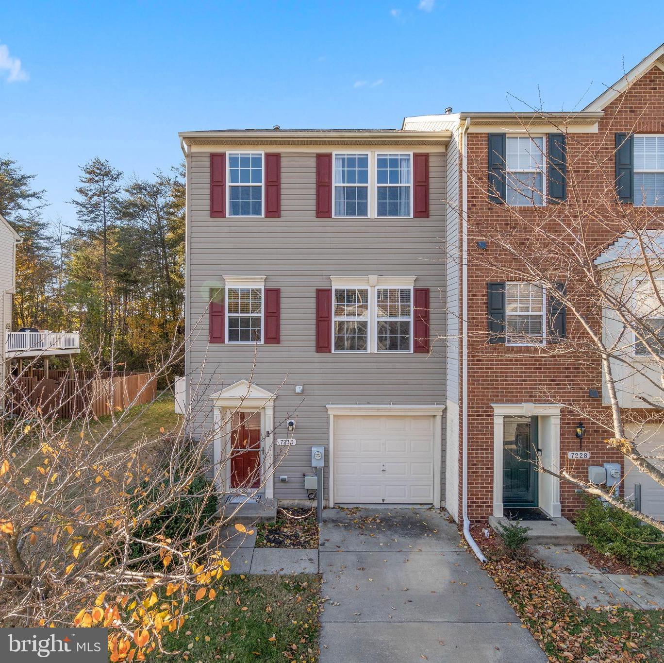 Move right in to this fantastic end unit garage townhome in Tanyard Springs! Bump outs on all 3 levels provide additional living space. 3 bedrooms with 2 full and 1 half bathroom and updates throughout.  Wood floors, neutral paint, bright and open concept main living level with access to your fully fenced rear yard.  Lower level rec room/office .  Kitchen opens to main living area, dining room and bonus space with access to a large deck- perfect for entertaining.  Large primary suite with en suite bathroom and walk in closet.  Close to shopping, dining & entertainment. Enjoy all the amenities Tanyard Springs offers- play grounds, pools, sports fields, dog parks and so much more.  Easy commuter access. Schedule your private showing today!