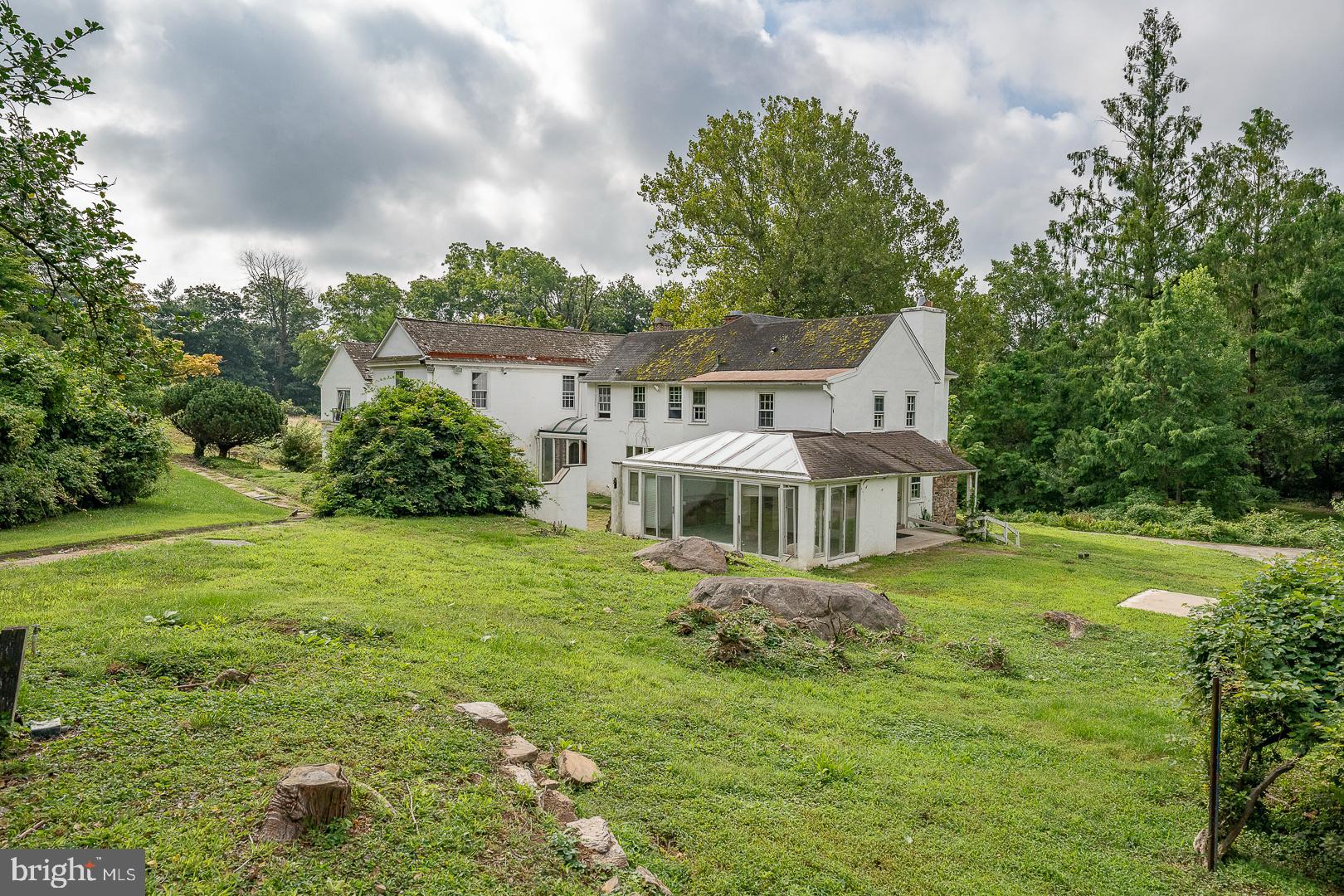 This exceptional Villanova property offers a unique opportunity to own a historic estate  in the sought-after Lower Merion School District.
The grounds are beautifully landscaped with mature plantings, providing a peaceful setting for your future home. Conveniently located close to shops, restaurants, schools, and major roadways, this property offers both privacy and accessibility.
House is sold in as is condition