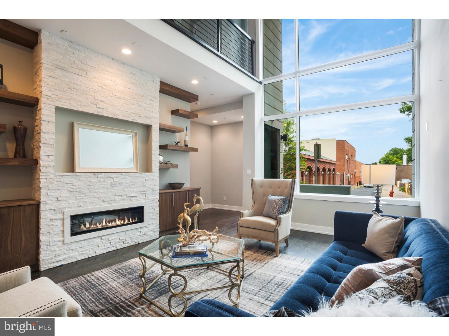 This stunning new construction home offers 4 Bedrooms, 4 Full Baths, 2 Powder Rooms, an elevator and 2 car secure parking in Society Hill. Originally the model home, this unit has several upgrades included for the discerning buyer. The first floor offers a stunning open floor plan designed with entertaining in mind with 20 foot ceilings, a surround sound system and a Living Room with a stunning gas fireplace as the focal point. The professionally designed Chef's Kitchen showcases custom-built cabinetry, bar seating, stone counters, top of the line appliances including a Sub-Zero refrigerator, stainless floating hood, wall oven, microwave and features cove & under cabinet accent lighting and a beautiful glass backsplash. Ascend to the second floor where you will find the Master Suite. This room boasts pure luxury with a private deck, two walk-in closets and a Spa-like Master Bath with an oversized shower (multiple shower heads), a freestanding soaking tub, heated floors, and a custom double vanity. The 3rd Floor features 2 large Bedrooms, two full en-suite baths, two walk in closets and a Laundry room with sink & counter space. Continue to the 4th floor where you will find an additional bedroom, full bath, an office/den and access to your second private deck. Last but not least, downstairs you will find the finished basement complete with Media room, Gym, a powder room and custom built wet bar. In addition to all of this you will enjoy elevator stops on every single floor, whole house audio, 3 zone HVAC, 2 alarm key pads, video intercom system and LED lighting throughout are just some of the intricate smart home features that are offered. Walking distance from many restaurants, bars, cafes, and the Delaware River Waterfront. 10 yr tax abatement pending. Please note, some photos have been digitally staged. Don't wait ? Schedule your showing today! Please check OPA for 2019 taxes due to possible citywide reassessment.