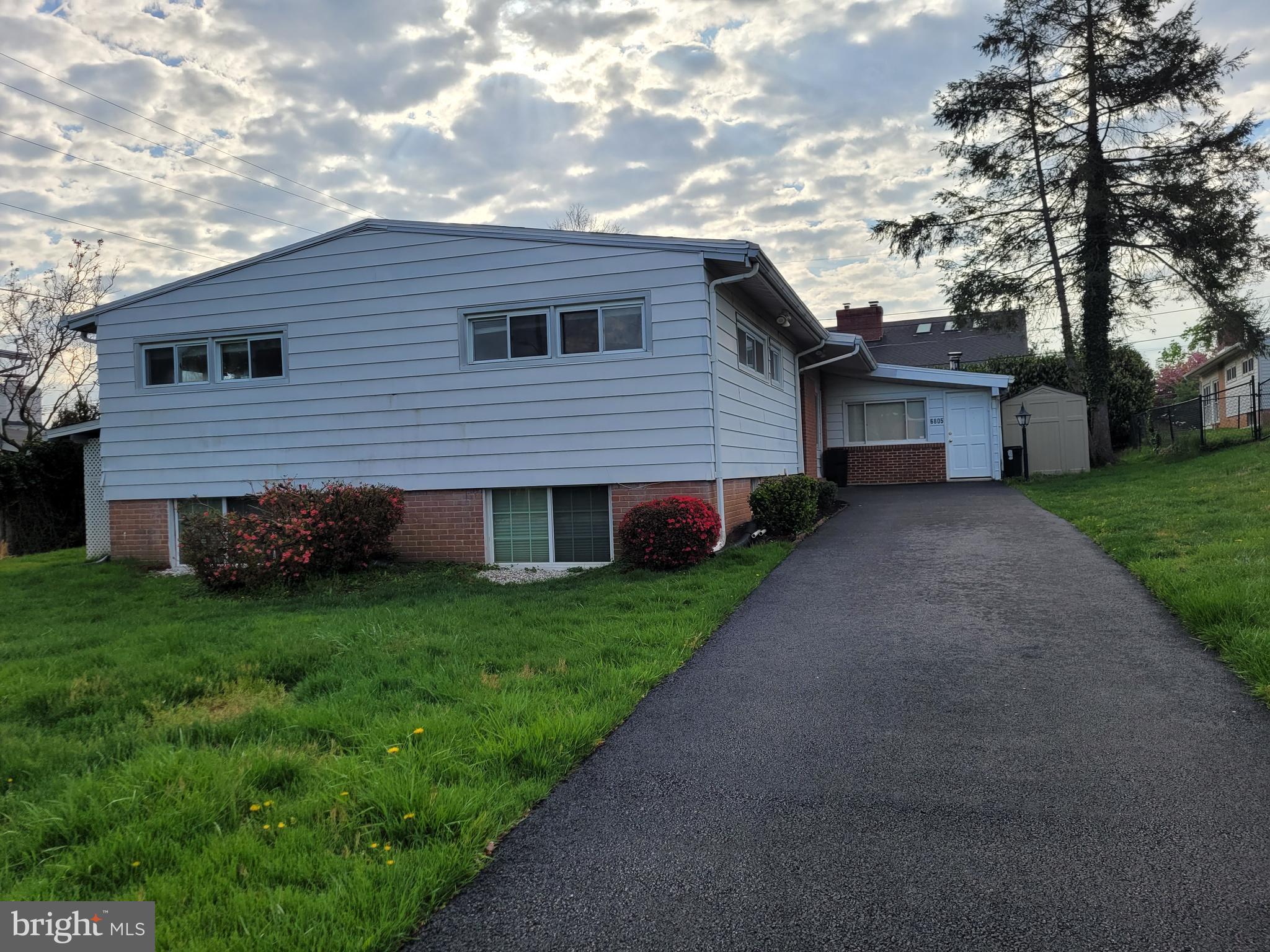 ***OPEN SUN MAY 17  1-2:30***Rarely available  expanded and updated home in the Summit Park neighborhood of Baltimore County.  Gleaming wood floors, spacious open floor plan with cathedral ceilings, updated kitchen with granite counters. First floor family room with ceramic floor and separate entrance. Huge lower level with full updated bathroom.  Don't miss this one!  See and make offer!