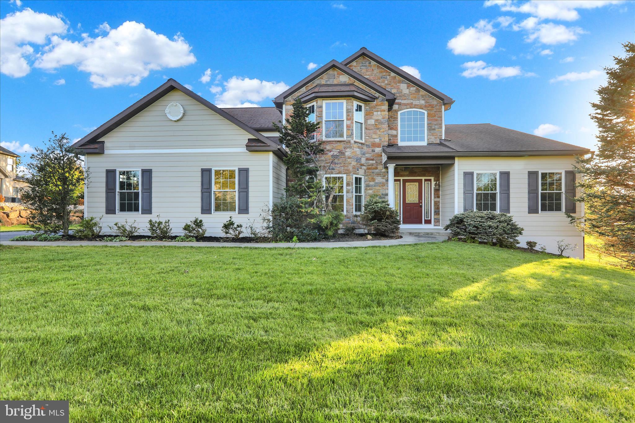 Welcome to Golden Oaks, a sought-after golf course community, where this stunning four-bedroom, two-story home offers style, comfort, and an impressive list of recent upgrades. From the moment you arrive, the brand-new front façade creates exceptional curb appeal and sets the tone for this beautifully maintained property. A rare first-floor primary suite adds convenience and versatility to the already desirable floor plan. Step inside the welcoming foyer leading to a spacious living room highlighted by a cozy gas fireplace. The open cherry kitchen is designed for both everyday living and entertaining, featuring tile flooring, a large center island, all appliances, and a sunny breakfast area. Just beyond, the bright family room showcases a wall of windows that fills the space with natural light while offering peaceful views of the rear yard. The formal dining room adds elegance with a bay window, chair rail, and crown molding, while a private office provides the perfect work-from-home retreat. The main-level primary suite has been beautifully remodeled and features hardwood flooring, a tray ceiling, walk-in closet, and a luxurious full bath with soaking tub and tile shower. A laundry room and half bath complete the first floor. Upstairs, you’ll find three additional generously sized bedrooms, a full bath, and an open overlook to the main living area below. The unfinished basement provides abundant storage and endless possibilities for future living space, recreation, or a home gym. Additional improvements include new hardwood flooring, insulated garage doors, updated exterior finishes, and a new roof ridge vent. Outside, enjoy a two-car side-entry garage, expanded driveway, and a spacious rear deck overlooking the open backyard—ideal for relaxing or entertaining. Move-in ready and located in one of the area’s most desirable communities, this exceptional home is ready to impress. Schedule your private showing today!