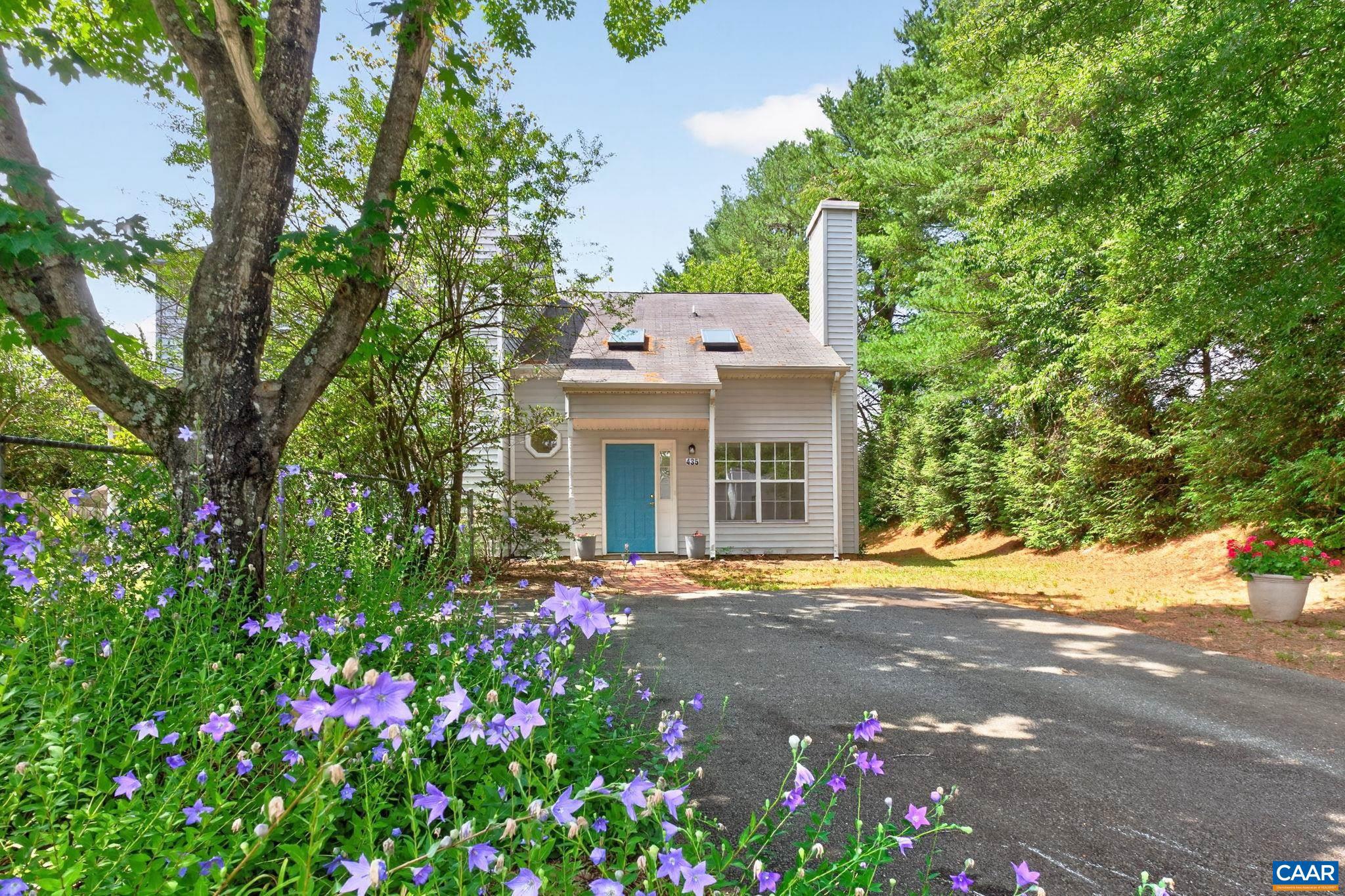 Tucked away at the end of a quiet street in Charlottesville?s desirable Woolen Mills neighborhood and located just off the Rivanna River, this beautifully updated 2-bedroom, 2-bath end-unit offers the perfect blend of peace & convenience. Backing to tranquility, you?ll enjoy a private, serene setting with little through traffic, while a nearby bus stop makes getting around town effortless. Inside, fresh paint, new luxury vinyl plank flooring, & an abundance of natural light create a bright, welcoming feel. Skylights fill the living room with sunshine, & the refreshed kitchen features a new sink, faucet, refrigerator, range, & dishwasher. Whether you?re looking for a low-maintenance home to call your own or an investment in a fantastic location close to downtown, this move-in ready property is one you won?t want to miss.,Fireplace in Living Room