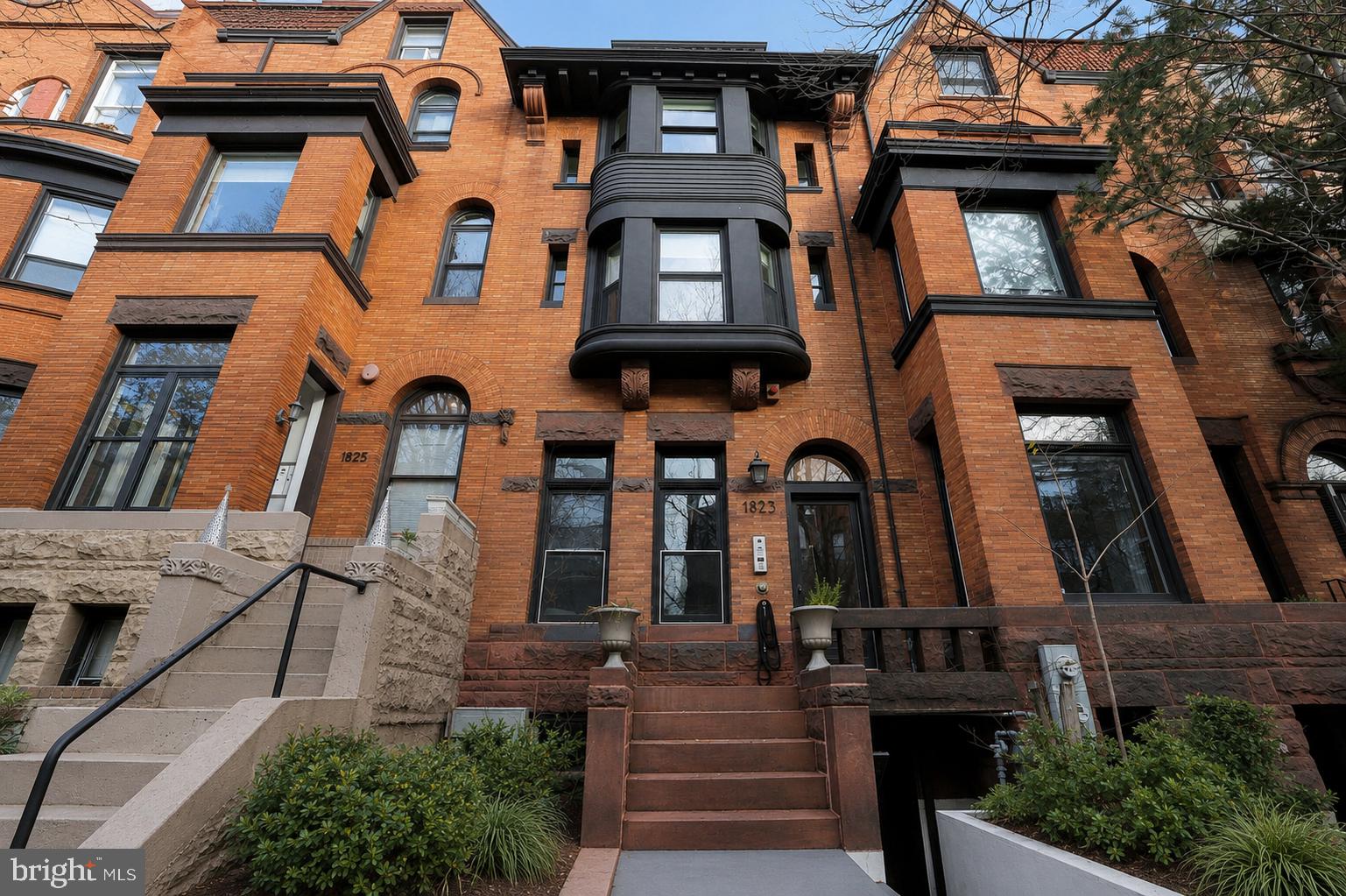 Positioned along Kalorama Road in the heart of Adams Morgan, 1823 Kalorama Road NW presents a rare opportunity to acquire a fully leased, comprehensively renovated five-unit multifamily property with four private parking spaces. Originally built in 1900 and extensively reimagined in 2019, the historic brick building pairs classic Washington character with polished contemporary interiors, creating a turnkey investment in one of the city’s most dynamic and consistently sought-after neighborhoods.

Arranged across five levels, the property offers a desirable and versatile unit mix. The lower level includes two one-bedroom, one-bath residences. The main and second levels each feature expansive two-bedroom, two-bath homes, including private outdoor space off the main-level residence. Occupying the third and fourth floors, the two-level penthouse serves as the building’s signature home with two bedrooms, two full bathrooms, a powder room and seamless indoor-outdoor living.

Each residence has been thoughtfully finished with solid hardwood floors, high ceilings, recessed lighting, oversized windows and in-unit laundry. Sophisticated kitchens feature custom cabinetry, stone countertops, professional-grade stainless steel appliances and generous islands designed for both everyday living and entertaining. Spa-inspired bathrooms are appointed with marble tile, freestanding soaking tubs, glass-enclosed rainfall showers and designer fixtures. Select residences also offer private terraces, expansive city views and exceptional natural light.

Four on-site surface parking spaces provide a level of convenience that is exceptionally rare in this part of the city and further enhance the property’s long-term tenant appeal. Fully leased and TOPA-compliant, the building offers immediate income alongside enduring value and future flexibility.

Just moments from the restaurants, cafés and nightlife of Adams Morgan’s 18th Street and Columbia Road corridors, with easy access to Dupont Circle, Embassy Row and downtown Washington, 1823 Kalorama Road NW is a distinctive investment offering defined by location, thoughtful design and an unusually complete collection of urban amenities.