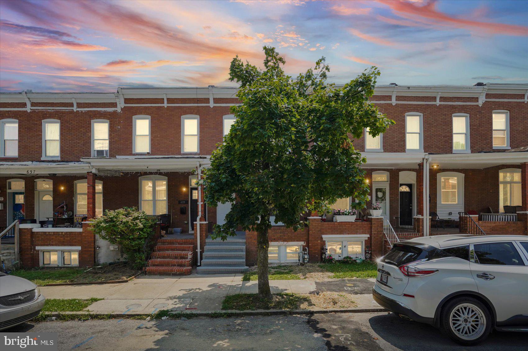 Beautifully renovated classic Baltimore townhome that perfectly blends timeless character with modern style. From the moment you step inside, you'll appreciate the thoughtful updates, contemporary finishes, and inviting open layout designed for today's lifestyle.

The sun-filled main level showcases elegant tray ceilings, recessed lighting, modern fixtures, and a striking accent wall that creates a stylish focal point in the living room. The beautifully designed kitchen is a standout, featuring stainless steel appliances, abundant cabinetry, a spacious center island, and contemporary pendant lighting—perfect for cooking, entertaining, or casual dining.

The mostly finished lower level offers additional flexible living space along with a convenient half bathroom, making it ideal for a family room, home office, gym, or recreation area.

Upstairs, you'll find two bright and spacious bedrooms filled with natural light, along with two beautifully updated full bathrooms featuring sleek, modern finishes.

With its seamless blend of classic Baltimore charm and today's most desirable updates, this move-in-ready home is the perfect place to call your own.