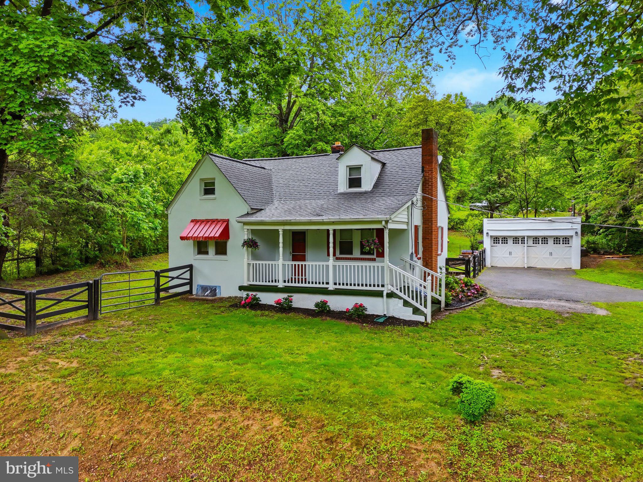 Nestled in the heart of Virginia's scenic Blue Ridge countryside, 13030 John Marshall Highway offers the perfect blend of charm, privacy, and convenience. Situated on just over 2 beautiful acres, this well-maintained Cape Cod features 3 bedrooms and 1 bath. Enjoy your morning coffee on the covered porch. Inside, you'll find spacious living and dining areas, and a bright kitchen ready for everyday living. With new paint, flooring, and carpet this home is move-in ready. The unfinished basement offers extra space for storage or finish it to add additional living space. A detached garage, mature landscaping, and open yard space proved endless possibilities for gardening, recreation, or simply enjoying some fresh air! Part of the property is fenced in which makes it perfect for goats, chickens, or sheep. Enjoy the serenity of country living while remaining just minutes from I-66, making commuting to work a breeze.
Roof replaced in 2018 with 30 year architectural shingles.
