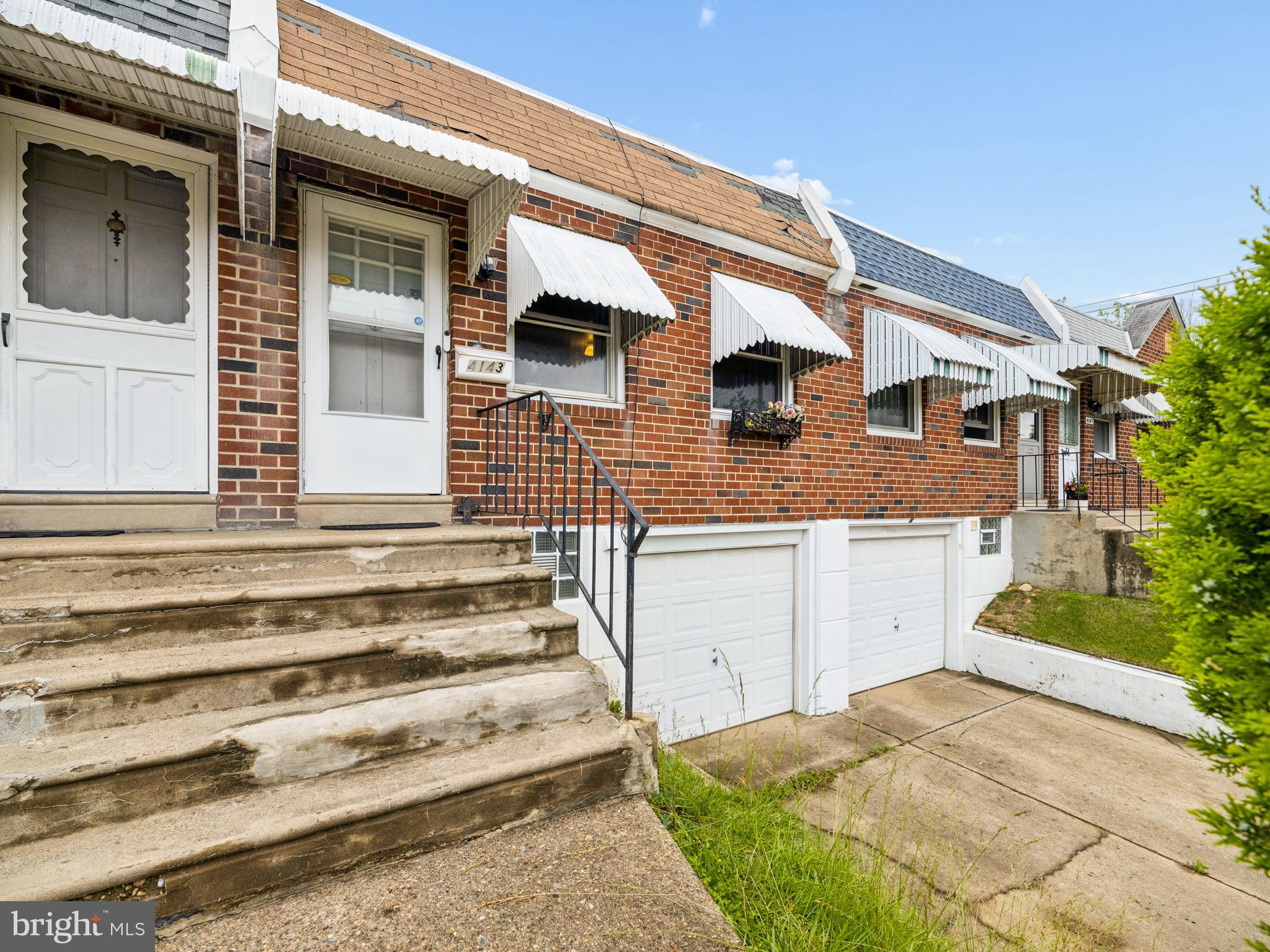 Opportunity awaits at 4143 Glenview Street in the heart of Tacony! This 2-bedroom, 1-bath row home with attached garage is perfect for investors, flippers, or buyers looking to add their own personal touch. Featuring a traditional layout, spacious living area, and lower-level laundry,  finished basement space with garage access, this property offers solid potential and plenty of value-add opportunities. Conveniently located near shopping, public transportation, major roadways, and local parks. Property is being sold in as-is condition and will require TLC, but with the right vision, this home can truly shine. Great chance to renovate and build equity in a desirable Northeast Philadelphia neighborhood!