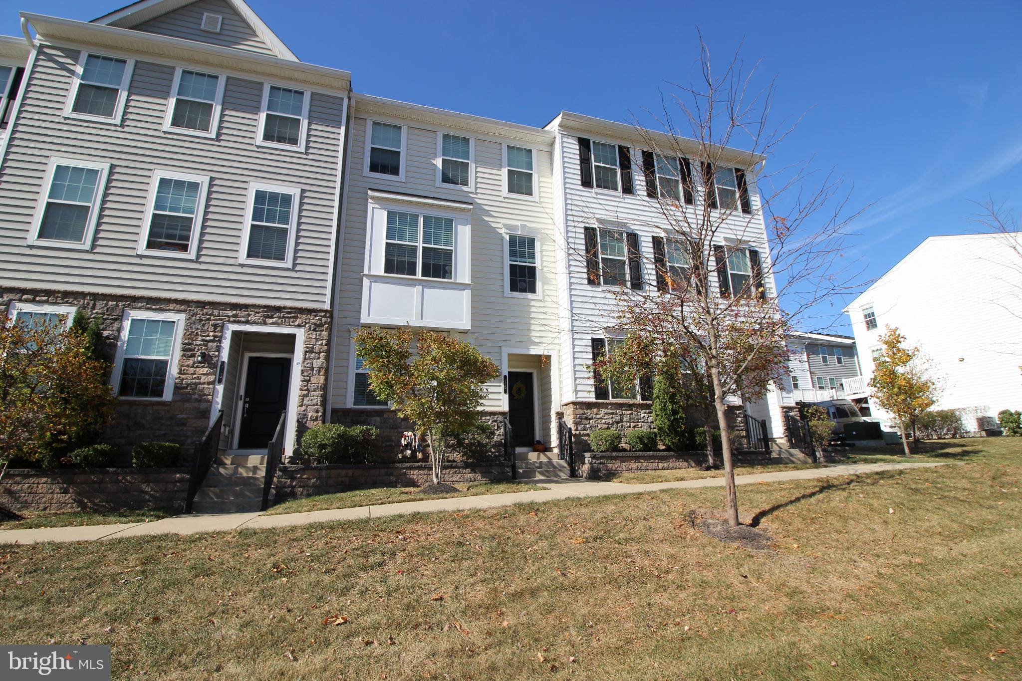Spacious "Hatboro Station" townhouse  built by Toll Brothers, with appealing open floor plan .  Main level has gourmet kitchen with 42" tall white shaker style cabinets.  Large island with granite top, ideal for entertaining.  Custom backsplash.  Kitchen features stainless steel appliances- gas cook top,  wall oven, built in refrigerator, dishwasher.  Living room with box bay window, recessed lighting, crown molding.  powder room and open stairs to upper level. Dining area has ship lap wood accent wall,  sliding glass doors to raised Trex deck that spans the width of the townhouse.  Both levels  feature luxury style  wood flooring.   Continue upstairs to  the master suite and 2 additional bedrooms and laundry closet. The master suite features- tray ceiling, crown molding, large walk in closet, master bathroom  with double bowl sinks and stall shower. The 2nd and 3rd bedrooms  are generous in size, one has a walk in closet and the other a double closet.  The entrance level has an open foyer, bonus room (could be 4th bedroom, office or workout room), and large storage closet .  The rear portion of the entry level is the 2 car garage with door opener. The highly desirable Hatboro-Horsham School District........ The monthly association fee covers exterior building maintenance, lawn care, and snow removal. A prime location close to shopping, dining, and within walking distance to the train. Schedule your appointment today—this home truly has it all!  Tenant occupied until July 31.
