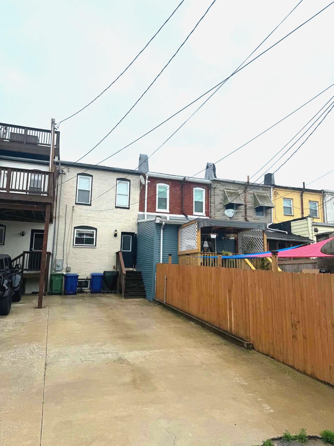 Rare Highlandtown Gem: Modern Luxury, Historic Charm, & 2-3 Car Parking Under $400K!
Welcome to the ultimate city oasis, offering the space and lifestyle of Canton with the unbeatable value of charming Highlandtown. Perfectly tailored for young professionals and growing families, this turnkey, brick-front historic rowhome (originally built in 1900 and completely renovated) blends timeless Baltimore character with sleek, modern upgrades.

Main Level: Bright, Open, & Inviting
Step inside to a sun-drenched, open-concept main level anchored by a beautiful front window that floods the space with natural light. The inviting living room features stunning original exposed brick walls that stretch across the first two floors. Flow seamlessly into the gourmet chef’s kitchen, fully equipped with premium granite countertops, an expansive layout, and stainless-steel appliances—perfect for hosting weekend dinners or casual morning coffee.

The Ultimate Premium: Secure 2-3 Car Parking
The rear exit off the kitchen opens directly to a massive, private rear parking pad located right at the alley entrance for incredibly easy, safe, and hassle-free access. In the city, guaranteed parking for 2 to 3 cars is an absolute game-changer.

Upper Level: Primary Suite & Bright Bedrooms
The top floor features a spacious primary bedroom suite complete with a massive walk-in closet and a private en-suite bathroom boasting modern, high-end fixtures. Down the hall, the secondary bedroom offers tall ceilings and excellent natural light, making it an ideal nursery, guest room, or dedicated work-from-home office space right next to the second full hallway bath.

Finished Lower Level: Maximum Versatility
The fully finished lower level offers the perfect flexible footprint for entertaining, a children's play room, or a media den. It includes two additional versatile rooms (perfect for a home gym or guest space), generous dedicated storage, a laundry area with a new washer/dryer, and a convenient third full bathroom.

Enjoy the best of Baltimore living—just minutes from Patterson Park, Fells Point, Harbor East, Johns Hopkins Medical Campus, Bayview Hospital, I-95, 695, local dining, and easy commuter transportation—without sacrificing space or parking. Schedule your tour today!