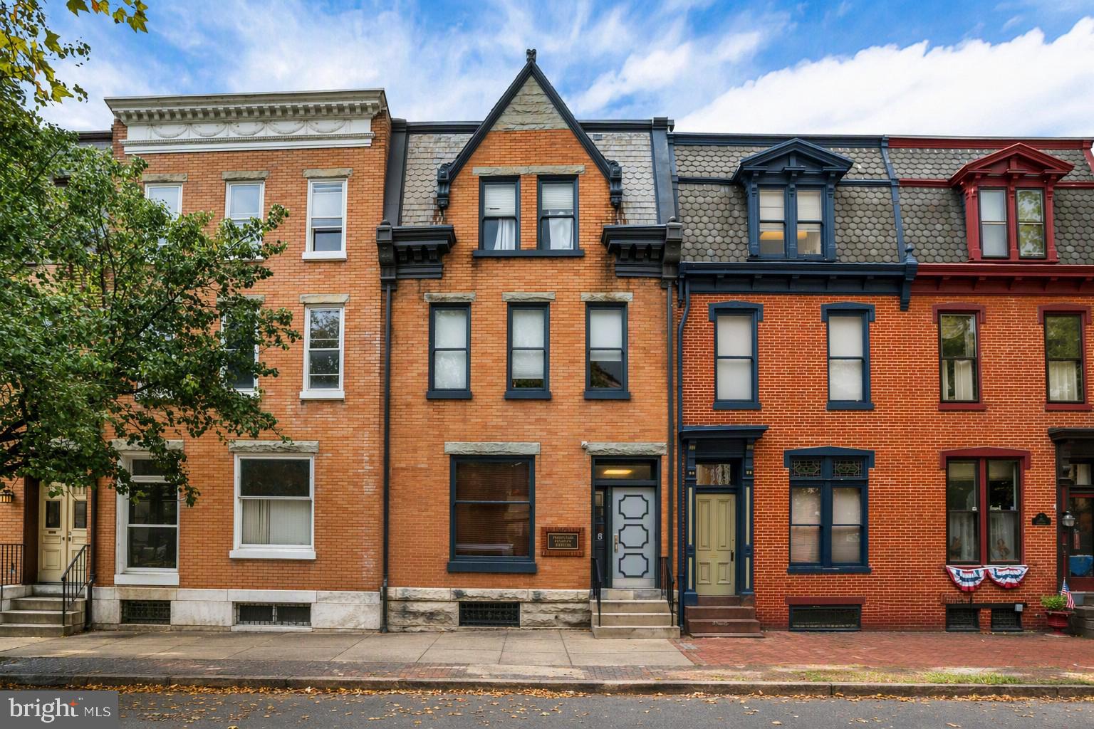 This unique 4,356-square-foot commercial property offers exceptional flexibility for investors, owner-occupants, and developers alike. Originally constructed as two side-by-side duplexes, the buildings have been thoughtfully combined into one expansive office facility while maintaining the character and versatility of the original structure. The current layout features numerous private offices, multiple conference rooms, a welcoming reception and common areas, and an expansive basement that provides abundant storage space for business operations, records, or equipment. The configuration is well-suited for professional offices, medical or counseling practices, nonprofit organizations, educational uses, or a variety of other commercial applications. Situated within the Commercial Neighborhood (CN) zoning district, the property is positioned in an area intended to support a vibrant, pedestrian-oriented environment that blends medium- to high-density residential development with neighborhood-serving commercial uses. The CN district encourages walkability and mixed-use development while limiting auto-oriented businesses, creating an attractive setting for both commercial and residential investment. One of the property's most compelling attributes is its redevelopment potential. Given its original residential design and generous floor plan, the building presents an excellent opportunity for conversion back to multifamily residential apartments, subject to municipal approvals and all applicable zoning and building requirements. Developers and investors may find significant value in reimagining the space to meet the growing demand for urban housing while preserving the property's historic character. Whether utilized as a turnkey office building or redeveloped into income-producing residential units, this property offers a rare combination of size, flexibility, location, and long-term investment potential.