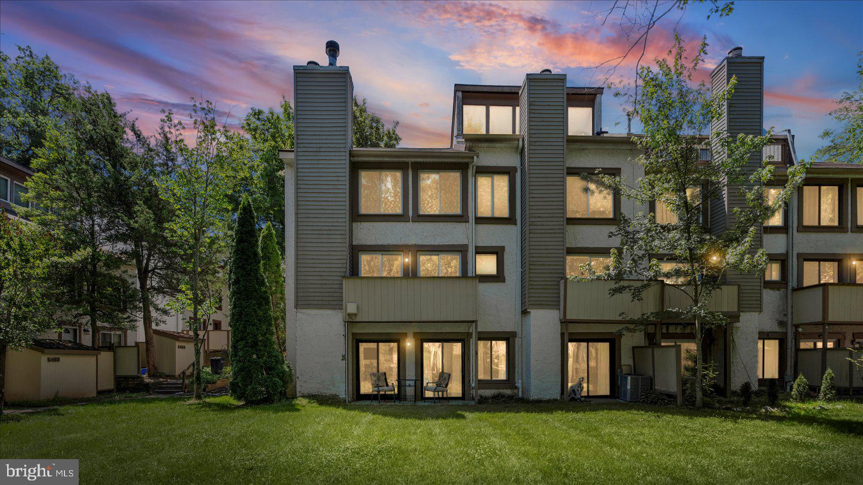 Beautifully maintained and move-in ready 2BR/2BA Condominium located on the main floor in the quiet community of Harpers Choice.  Step into a home filled with natural light, recessed lighting, and luxury flooring.  This ground-floor home offers access to an abundance of outdoor space including a private paved patio off of the front and multiple NEW sliding doors from each room that come with a 30 year warranty. The main living space features a large living room with a fireplace, a spacious dining room, and a recently updated kitchen.  The kitchen features abundant cabinetry extending to the ceiling, including a pantry cabinet and an added coffee bar, stainless steel appliances, and a double stainless sink and easily accessible private laundry room. Down the hall are a spacious secondary bedroom, a beautifully tiled full bath, and a primary suite.  The primary bedroom offers sliding doors to a private patio, two large closets, and a newly remodeled private full bathroom with a walk-in shower.  Step outside from either the living room, bedrooms, or dining room to private outdoor spaces to enjoy with family and friends.  This move-in-ready home is ideal for any new homeowner and offers a newer HVAC system, a newer water heater, a lifetime warranty French drain, and so much more.  Enjoy all of the amenities of the Columbia Association and imagine all this in close proximity to shopping, restaurants, and commuter routes.
