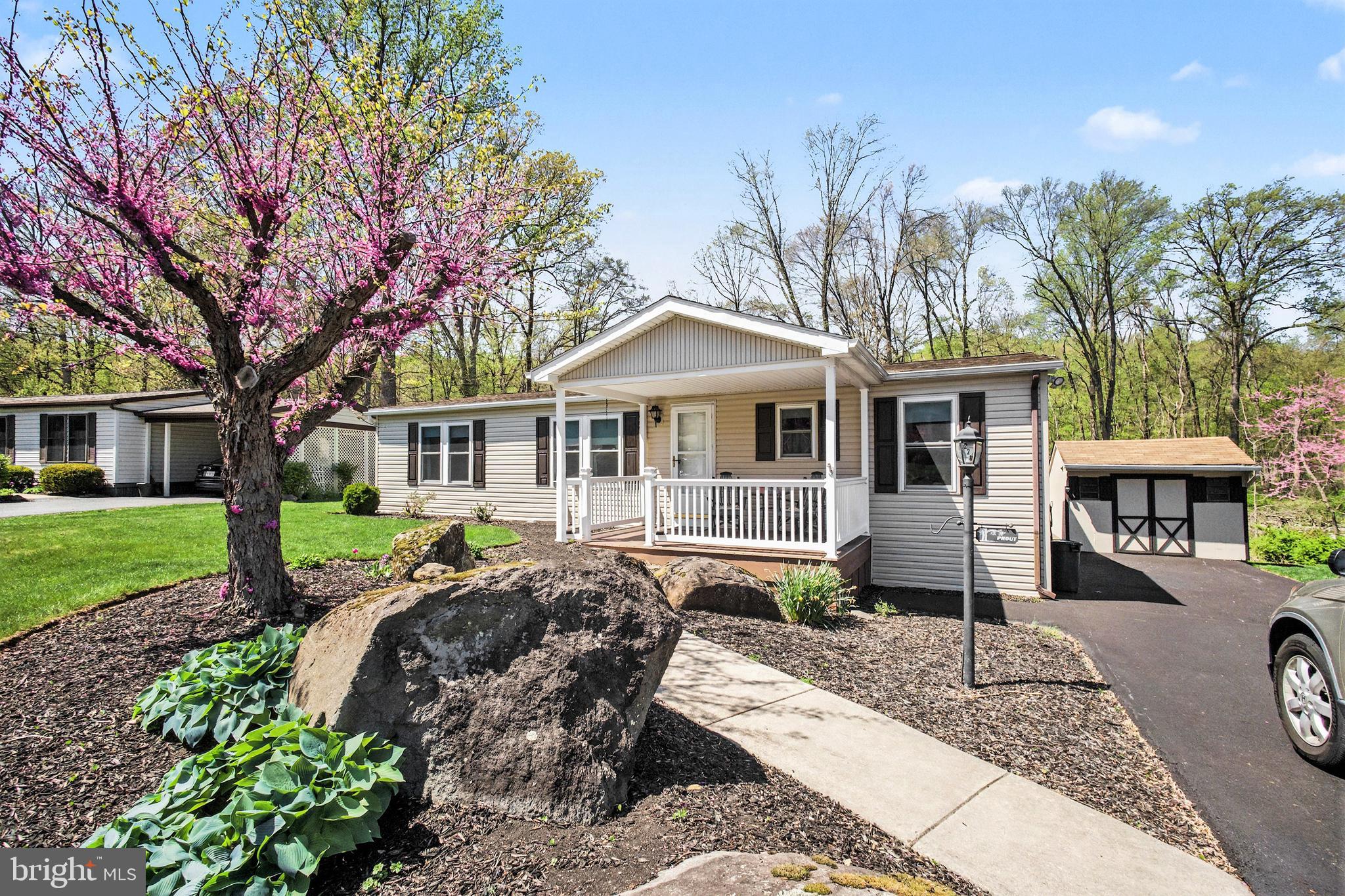 Welcome to easy living in the desirable 55+ community of Gretna Springs in Manheim! This beautifully maintained home offers the perfect blend of comfort, style, and low-maintenance living. From the moment you arrive, you’ll be drawn in by the home’s exceptional curb appeal and inviting presence.

Inside, you’ll find a bright and spacious layout designed for everyday living and entertaining. A stunning four-season room provides the perfect space to relax year-round while enjoying peaceful, wooded views—ideal for watching nature right from your own home.

Recent updates provide peace of mind and added value, including newer HVAC, brand-new Trex decking and stairs, new vinyl siding with wrapped insulation for energy efficiency, and a recently repaved driveway. A convenient shed offers additional storage for all your outdoor needs.

Step outside to enjoy the private setting out back, where the wooded backdrop creates a serene escape rarely found. Whether enjoying your morning coffee or unwinding at the end of the day, this home offers a true sense of tranquility.

Don’t miss your opportunity to own a move-in ready home in one of the area’s most sought-after 55+ communities!

Professional Photos will be available very soon.