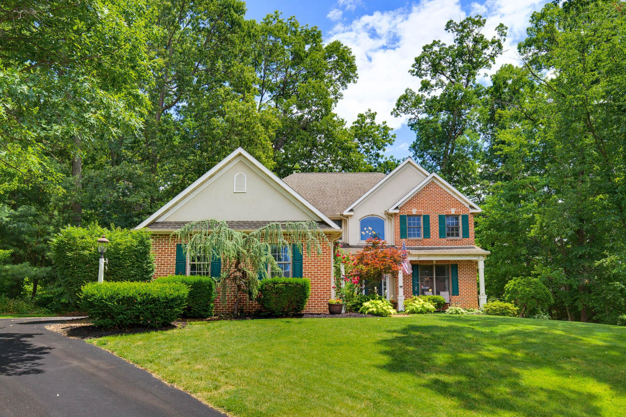 Your private get away from the hustle and bustle awaits in this spacious 4,436 sq. ft., five Bedroom, three full and one-half bath home in West Hempfield Twp. 3276 Verdant Grove is located in Park Woods, a respite for approximately 10 homes and tucked away on a quiet cul-de-sac, nestled among trees and lovely mature landscaping.  Surrounded in nature, yet conveniently located; just minutes from Down-Town Lancaster, Medical facilities, major roads, Schools, shopping and more.  Features include: an open floor plan and large windows providing great natural light and views of mature trees. There is a dedicated first floor office just off the family room, with a gas fireplace and Built-ins.  The spacious kitchen flows to a dining area and screened-in deck.  Additionally; there is a formal dining, formal living room and a powder room llocated just off the two story Foyer.  The first floor laundry & mudroom with cubbies connect to the three-car garage.  The lower level is nicely finished and includes a game room, a workout area, a bedroom and a full bath with shower.  The walk-out lower level has sliding doors for easy access a patio and private back yard.  Upstairs, are four bedrooms and a family bath with two sink vanities, pocket door separates the tub and shower area.  The spacious primary suite has a walk-in closet and a spacious full bath, including a jacuzzi tub, glass enclosed shower and double sink vanity.  A hidden gem in a unique location!  Shown by appointment only.