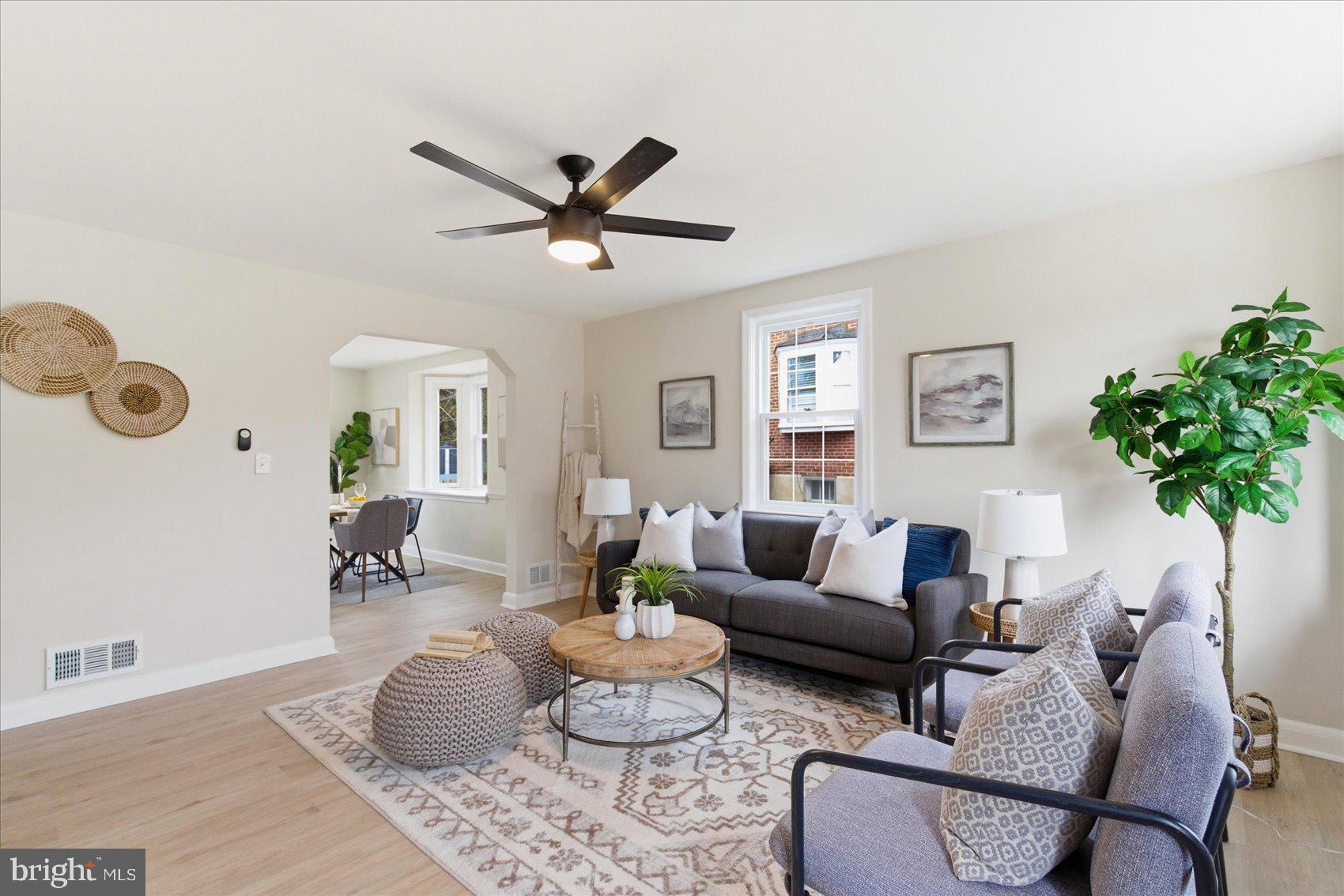 MOTIVATED SELLER!! Beautifully renovated 4-bedroom, 2 full bath end-of-group rowhome in desirable North Bend! This light-filled home features an abundance of natural sunlight, highlighted by two stunning bay windows — one in the living room and one in the dining room — creating bright and welcoming spaces throughout.

The updated kitchen is designed for both style and functionality, offering quartz countertops, a spacious island, stainless steel appliances, and gas cooking. Step right out to the deck off the kitchen — perfect for entertaining or enjoying outdoor dining.

Upstairs, you’ll find three comfortable bedrooms with plush carpeting and a fully renovated bath featuring modern finishes.

The finished lower level provides a versatile fourth bedroom along with additional finished space ideal for a home gym, office, or recreation area.

Relax on the charming front porch — the perfect spot for morning coffee or evening cocktails. With thoughtful updates, generous living space, and incredible natural light, this home is truly move-in ready!