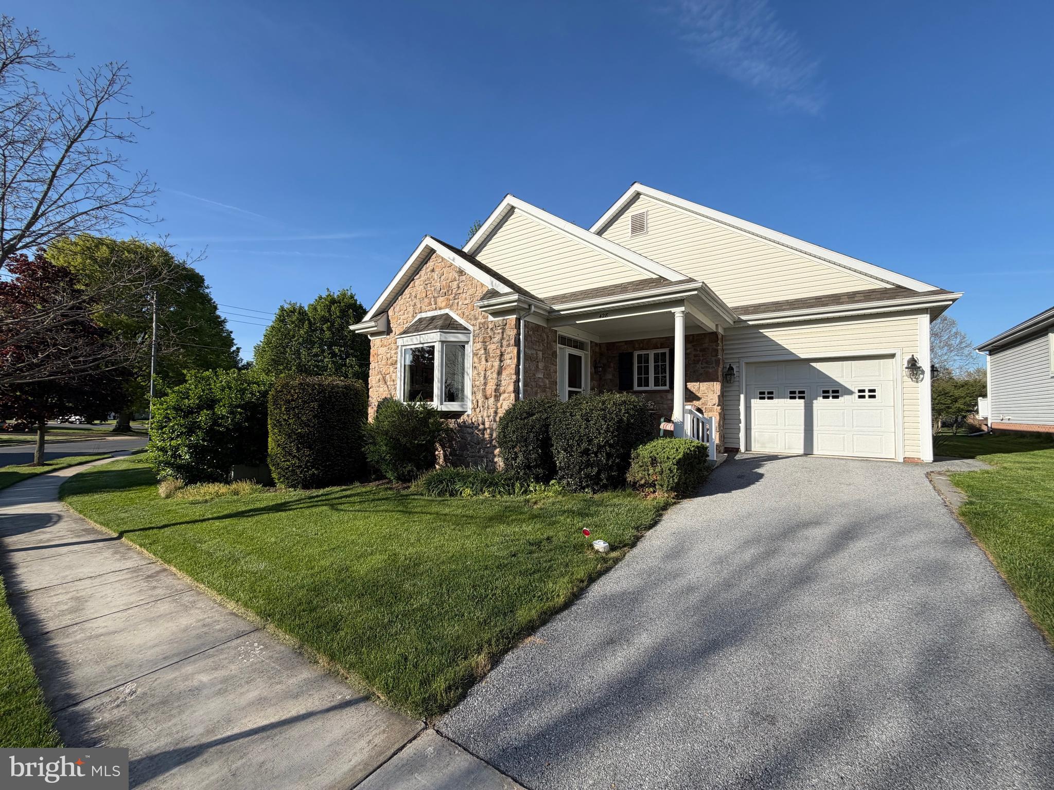 4-bedroom, 3 full bath home featuring a finished lower level with a mini living area—perfect for entertaining guests. Enjoy gas heat, central air, and a quiet street setting with a backyard that backs to open common space. Located in a great neighborhood ideal for walking, within the Manheim Township School District. The cathedral-ceiling living and dining area showcases hardwood floors, and the home includes an oversized garage. Offered at $514,900.