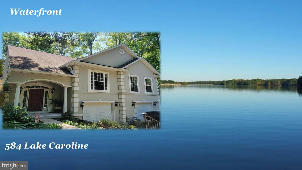 Stunning Lakefront home in Beautiful Lake Caroline! Nestled in a quiet cove, this gorgeous Waterfront Stucco comes with mature & natural landscapes leading down to your shoreline with a boat dock & patio deck. Ample room for boats, jet ski and lots of water sport toys. Inside you will find vaulted ceilings, skylights, architectural angles & lots of windows bringing the outside lighting in. Complete gourmet kitchen with island, gas cooking & nice pendant accent lighting. Nice open floorplan with dining area, ceramic tile surround fireplace family room and kitchen combination. This Custom-built Hamlet Home - The "Catalina Model" comes with unique rounded edging, bamboo, marble, stained concrete flooring and a double basement foundation. Main floor living has 3 bedrooms, 2 baths, Living, Dining, Kitchen and head to the basement to find game room, 2nd tile surround gas fireplace, even a humidor! Flex space for 4th bedroom or in-law suite. Walk out level to the patio deck with stainless steel outdoor kitchen and a full-size Hot Tub with extra deck support. Plus, we have the 2-car attached garage & workshop/storage too! This home has it all - Buy Now for Summertime FUN on the LAKE! Lake Caroline is a Full-Service Lake offering: 277-acre Lake, 2 sandy beaches, clubhouse, playgrounds, tennis, pickleball, basketball, water ski, wakeboard, jet ski, pontoon, kayak, paddleboard. Swimming & Fishing, Pool with lifeguards. Enjoy S'mores at your dock after Fun in the Sun! Lake Caroline is located just off I-95 between DC & Richmond, close to Shopping, Golf, Wineries, Kings Dominion Amusement Park, Dominion Raceway & the New Kalahari Waterpark opening later this year! Come Check it Out Today!