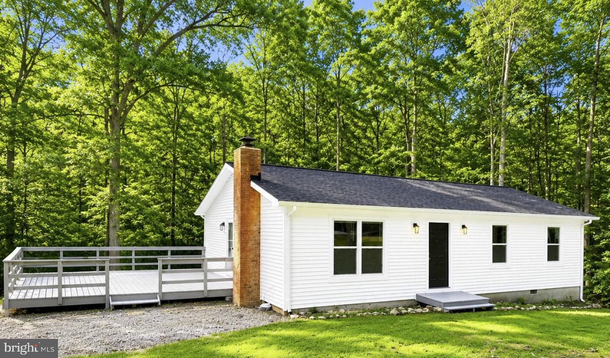 Life is better at the lake. Discover this beautifully updated water access home on the public side of Lake Anna, where weekends are spent on the water and evenings are enjoyed by the fire. Featuring 3 bedrooms, 2 bathrooms, and approximately 1,200 square feet, this move-in-ready home has been enhanced with a new roof, new vinyl siding, and fresh interior paint, making it as worry-free as it is inviting.
The spacious deck is perfect for summer cookouts, morning coffee, or relaxing after a day on the lake, while the cozy wood-burning stove creates the perfect atmosphere year-round. Assigned boat slip provides convenient access to boating, fishing, swimming, and everything that makes Lake Anna one of Virginia's most sought-after destinations.
Whether you're looking for a full-time residence, weekend escape, or income-producing vacation rental, this updated home offers the opportunity to enjoy lake living from day one.