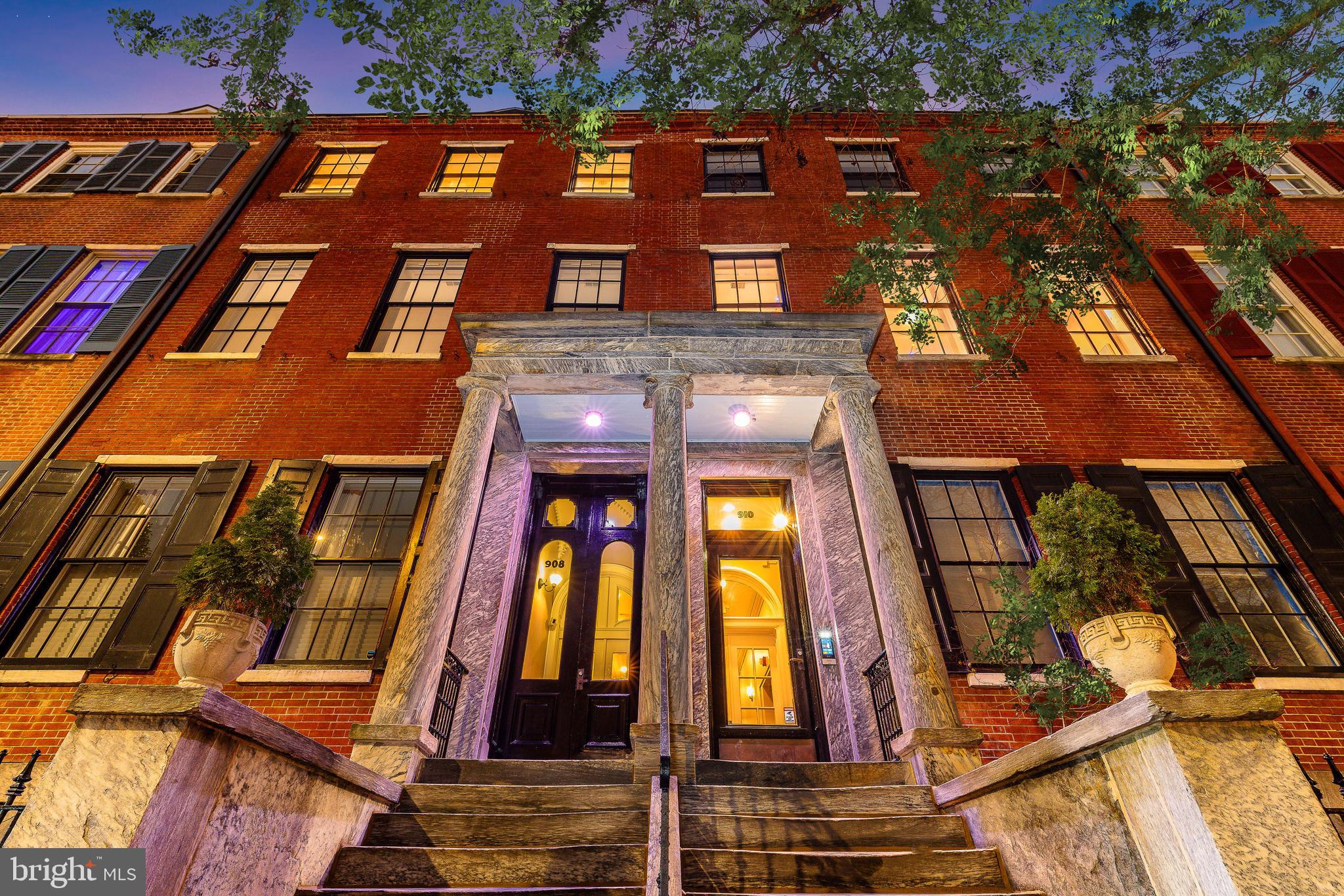 Exceptional Condo Unit on Historic Portico Row in Washington Square West: Nothing short of extraordinary—a crown jewel reimagined for modern living in a combined pair of meticulously redeveloped, mansion-style elevator buildings.

Medical professional? A huge perk: Jefferson, Pennsylvania and Wills Eye Hospitals all nearby. Families will appreciate the McCall School catchment, and yes, pets are welcome....Plus.....

This rare tri-level 3-bedroom, 2.5-bath home - drenched in natural light thanks to its dual exposures and two skylights - delivers sleek sophistication at every turn.

Private outdoor space?  Check.
PARKING?  Absolutely. This is city living elevated.

On the first level, the stunning open floor plan anchored by a custom-designed chef's kitchen will leave you in awe. Equipped with double Wolf ovens, a 6 burner Wolf range, Sub-Zero refrigerator, and expansive island plus custom cabinetry under the stove for housing cookware - this is the ultimate space to cook, entertain, and connect.

Picture guests mingling around the island, spilling into the dining area and flowing effortlessly into the inviting living area with cozy fireplace, sleek nook plus convenient powder room.

The second floor offers two generously sized bedrooms (both virtually staged) with fantastic closet space, a smartly designed shared bathroom, and large, separate laundry room—because convenience matters. There's even an additional egress door on this level for added practicality.

Your dreamy pièce de résistance: The Private Primary Suite on its own floor. This breathtaking retreat features a spacious bedroom with French doors opening to an enticing private terrace—perfect for morning coffee or evening unwind. The spa-like bathroom includes an oversized double shower, while the hallway boasts an abundance of closets leading to the bedroom. Need a home office or a cozy seating area? The spacious landing area has you covered.

Recent updates include a new roof for the unit and two new skylights completed in 2024, adding peace of mind to this already exceptional home; tankless water heater; new washer and dryer.

Now: Let's talk PARKING - an absolute luxury in Center City. Unit 10 comes with 1 on-site deeded parking space Plus the option to purchase a 2nd covered spot including a personal electric charging station in Bonaparte Garage around the corner.

Next: A Bikers' delight. There’s an indoor rack @ 908 Spruce with an opportunity for 1 bike. Additional outdoor space: Residents enjoy access to Common Outdoor Spaces on both the 908 and 910 sides of the property—noting 908's side common space can accommodate grilling or gardening.

The location? Simply unbeatable. You’re in the heart of it all with Washington and Rittenhouse Squares, Antique Row’s boutiques and eateries, 13th Street’s restaurant scene, Whole Foods and Acme markets minutes away, Walnut and Chestnut Street shopping, Reading Terminal Market, Mom's Organic, the Kimmel Center, several gyms and also dog parks all within easy walking distance. Commuters will love the proximity to PATCO, the Broad Street Line, and major highways.

Unit 10:  A lifestyle. From luxurious design to stellar location, this property defines modern city living. It could be your lifestyle; imagine.

Tours by appointment only.