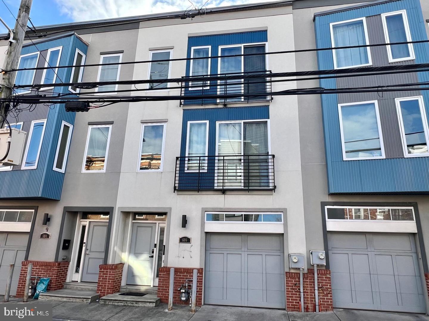 AVAILABLE JULY — Modern 3-Story Townhome | Private Garage | Olde Kensington

Perfectly positioned between Fishtown and Northern Liberties, this stunning 3-bedroom, 3-bath modern townhome delivers the space, style, and location today's buyer is chasing — with occupancy available this July.
Built in 2017, this 1,797 sq ft, 3-story row home offers an open-concept main level with hardwood floors throughout, a chef's kitchen featuring quartz countertops, stainless steel appliances, and a large island perfect for entertaining. The top-floor primary suite includes a walk-in closet, en-suite bath, and a private Juliette balcony with open sky views.
What sets this home apart: a private attached garage — one of the rarest features in this price range in the city — plus a wide 20-ft backyard patio ideal for outdoor living and entertaining. Three full bathrooms across three floors means no compromises for families, guests, or working from home.
Stepping outside, you're in the heart of one of Philadelphia's fastest-growing corridors. Steps from the Market-Frankford Line at Girard Station — 10 minutes to Center City — and walking distance to Sacred Vice Brewing, Punch Buggy Brewing, Good Spoon Soupery, Liberty Lands Park, and the entire Frankford Ave dining and nightlife scene. Indego Bike Share at 3rd & Girard puts Fishtown and Northern Liberties minutes away by wheel.
For investors, the numbers speak clearly — this zip code recorded 10.3% annual appreciation with 18 closed sales in the last 12 months and only 5 comparable homes currently available. Turnkey condition, modern build, no HOA fees, no condo fees.

Occupancy available July 2026. Schedule your showing today.