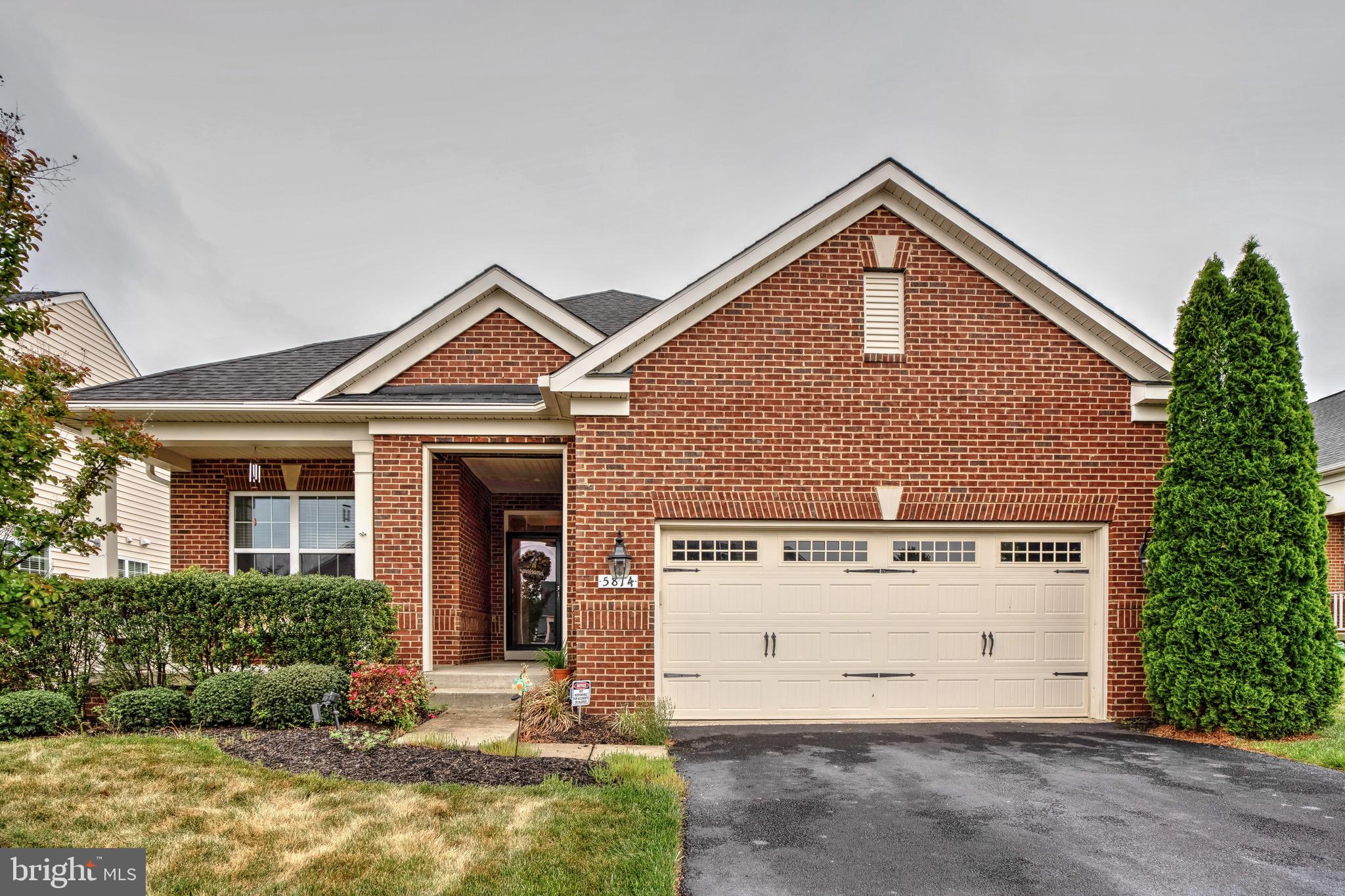 Welcome to refined, low-maintenance living in the highly sought-after 55+ Active Adult Community of Virginia Heritage! Located at 5814 New Berne Rd, this beautifully appointed residence combines elegant finishes, functional living spaces, and an exceptional location just minutes from Southpoint, Cosner’s Corner, shopping, dining, medical facilities, and more.
From the charming brick front exterior and inviting covered front porch to the spacious screened rear porch overlooking the fenced backyard, this home offers comfort and curb appeal at every turn. Inside, gorgeous wood flooring flows throughout the main living areas, complemented by an open-concept floor plan designed for both everyday living and entertaining.

The gourmet kitchen serves as the heart of the home, featuring a large center island, abundant cabinetry, generous prep space, and seamless flow into the dining and living areas. The main level includes three bedrooms, including a spacious primary suite with en suite bath, plus a second full bath, dedicated office space, and a separate laundry room for added convenience.

Downstairs, the partially finished basement expands your living space with a massive recreation room, full bath, and an abundance of storage space perfect for hobbies, seasonal décor, workshop space, or future expansion possibilities.

Additional highlights include a garage, sprinkler system, ample storage throughout, and thoughtfully designed indoor and outdoor living spaces that make this home truly stand out.

Enjoy the active lifestyle and outstanding amenities Virginia Heritage is known for, all while living in a beautifully maintained home in one of the area’s most desirable active adult communities.