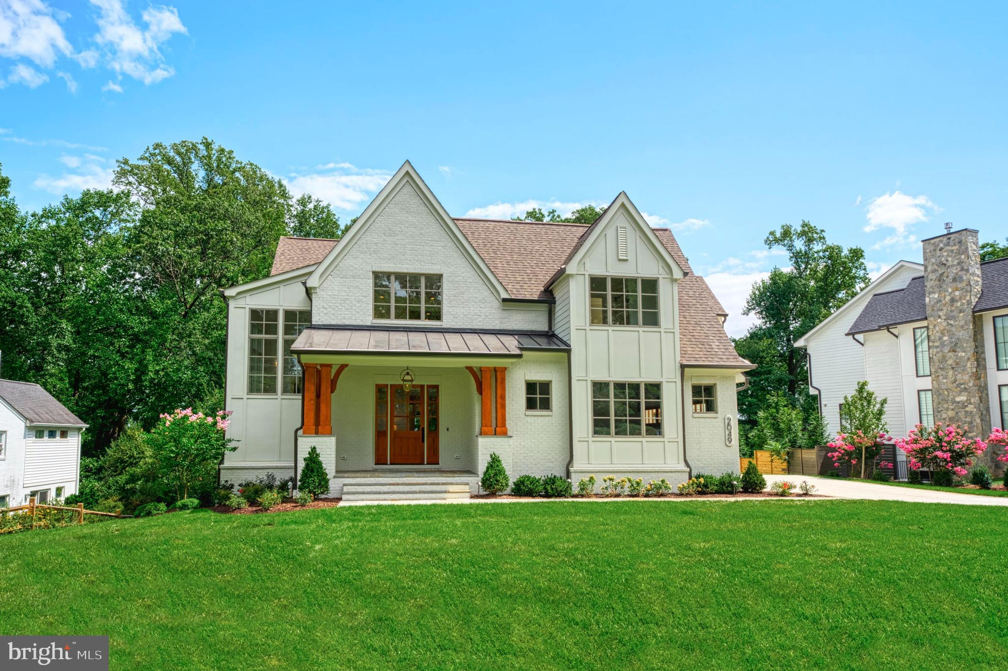 Another *PHENOMENAL* new home construction by MR Custom Homes - the premier local builder in McLean! This *SPECTACULAR* 6BR/7.5 BA luxury home on 3 finished levels (with over 8700 finished square feet) features a breathtaking and expansive 2-story foyer with wainscoting, high ceilings, and stunning hardwood floors.  The gorgeous main level features a gourmet chef's kitchen with dual islands and breakfast bar, top-of-the-line Wolf/Sub Zero/Asko appliance package, custom cabinetry, 2.5" quartz/stone countertops, apron sink, sunny morning room  with three skylights plus convenient butler's pantry, additional pantry and back kitchen! The kitchen opens to the family room with cedar beams along the ceiling, dramatic 42" stone hearth fireplace plus built-ins and doors leading out to the large screened porch with flagstone decking, outdoor gas fireplace, ceiling fan and speakers. The formal dining room features wainscoting; main level library/office/BR suite with full bathroom and main-level mud room with custom built cubbies off the garages. Upstairs, escape to the luxurious primary suite with a vaulted ceiling, gas fireplace, walk-in closets and spa-like en suite bathroom with double vanity, frameless shower, heated floors and soaking bath. The upper level also features three additional spacious bedrooms, each with en suite bathrooms and walk-in closets plus laundry room with sink. The walkout lower level includes sprawling recreation room with walk-behind wet bar, exercise room, bedroom and full bath plus storage.  This fabulous property also includes a 3-car garage and elevator-ready floorplan. Located on a beautiful 1/2 acre+ lot in sought after Franklin Park location! One of the highlights of this remarkable home is all the custom details throughout. A complete WOW! Chesterbrook, Longfellow, McLean Schools!