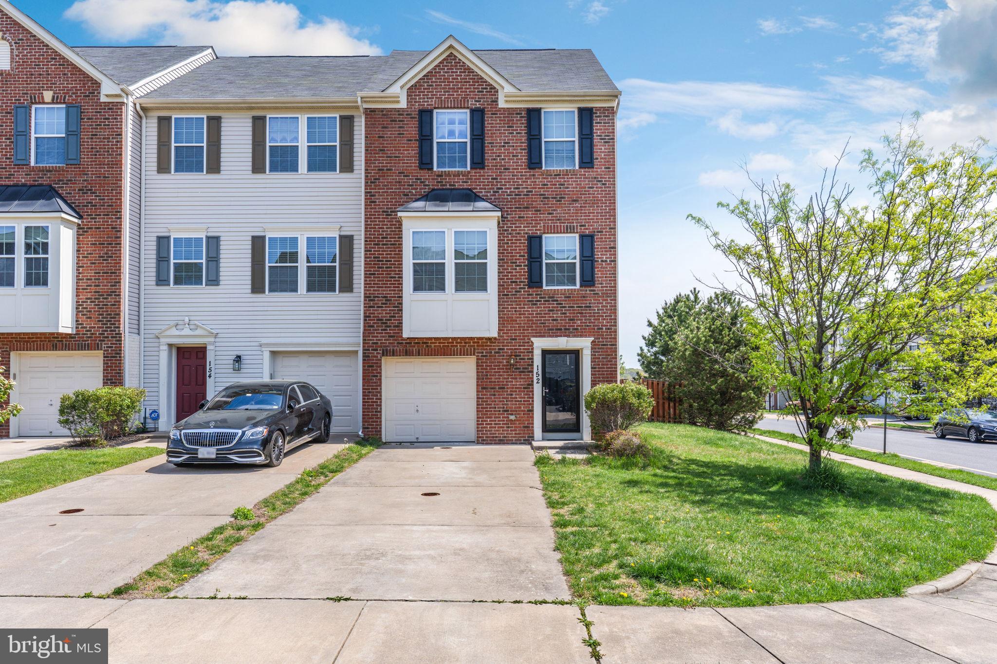 This is an end unit, three-level townhouse with three bedrooms and 2.5 bathrooms. The entry-level features a finished family room and a one-car garage. On the main level, you'll find a rear sunroom, an open kitchen with an island, a dining area, and a spacious family room that's great for entertaining. The master bedroom boasts a large walk-in closet, a double vanity, a soaking tub, and a separate shower.. There is also a fenced-in rear yard . The townhouse is conveniently located near shopping, Quantico, and commuter lots.
