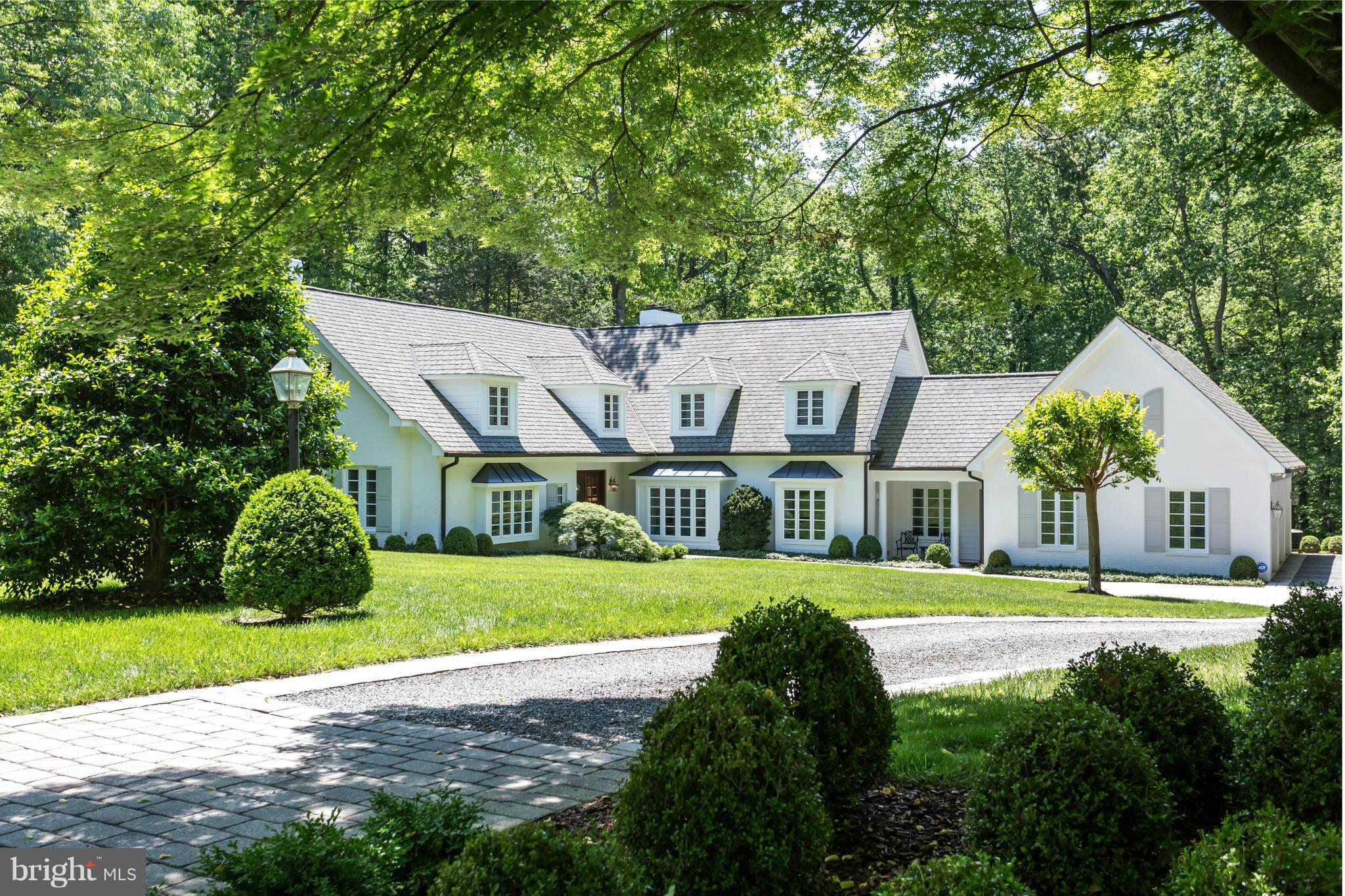 Distinctive Architectural Property on 1.93 acres of privacy on quiet cul de sac road featuring delightful main level living. High ceilings, beautiful windows offer great natural light & beautiful views. Open floor plan, chef's kitchen w/ high end appliances, all baths new or updated, spectacular master suite, private guest suite, walk out LL. View brochure, plat and floor plans in Documents