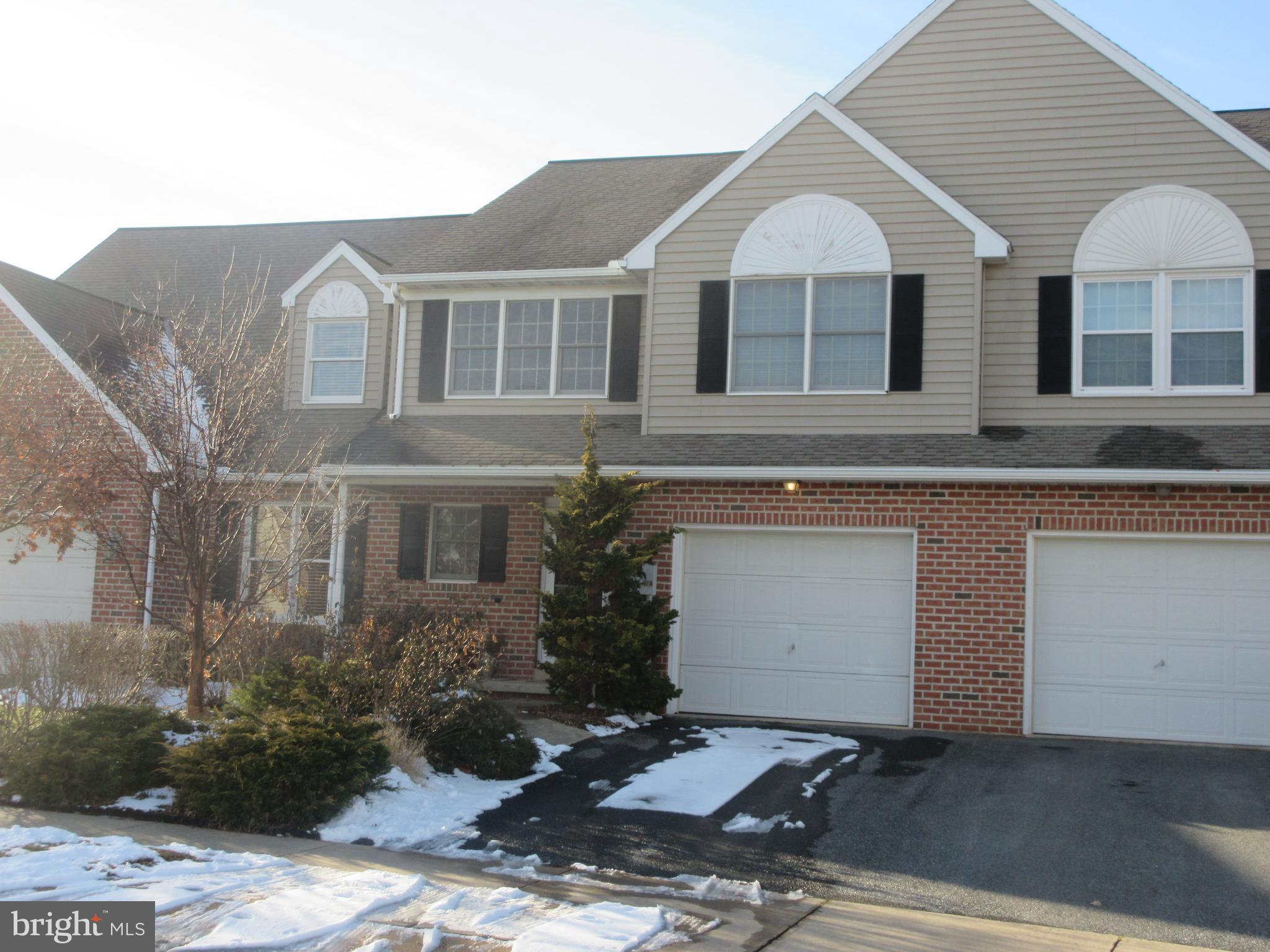 Welcome home to this well maintained and tastefully improved Summit Hills townhouse.  This home is move in ready and features an eat in kitchen with new granite counters,  open layout living room and dining room with skylights, first flr full bath with walk in shower, 1st flr laundry, 2nd floor loft and 2 good sized bedrooms with a Jack and Jill bathroom and more.  No HOA fees!   Ample storage.  Per the original owner, this town home was a custom build.