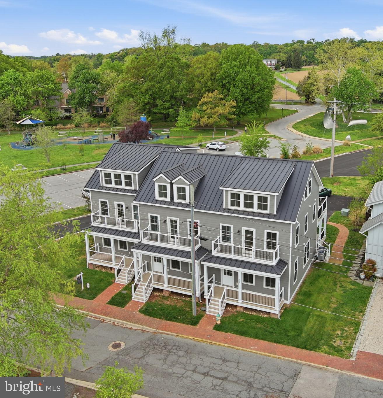 Newly constructed three-bedroom townhome with fantastic water views from the living level and bedrooms! Spacious open living space featuring a gourmet kitchen;  5-burner induction range, ample cabinet space, and a large island for entertaining. The home is filled with natural light and boasts multiple balconies and a front porch for relaxing. You'll love the warm hardwood floors throughout the home. On the second level you'll find two bedrooms and two bathrooms.
The third bedroom encompasses the entire third floor and has a great view of the Chester River.  You'll enjoy the large back balcony with views of historic Chestertown.  The third level could be used as the primary bedroom; there is a large full bathroom and closet. 
The townhomes have a private driveway, so you'll never worry about finding a parking space. 
Take advantage of the easy access to Wilmer Park and Chestertown Marina, located just across the street. 
This townhouse is located in the heart of all Chestertown has to offer! Just a short distance to shops, restaurants, renowned bakeries, and the year-round farmers market by Fountain Park. You will have a front-row seat to the Downrigging Festival! Not to mention the many festivals held in downtown Chestertown throughout the year.