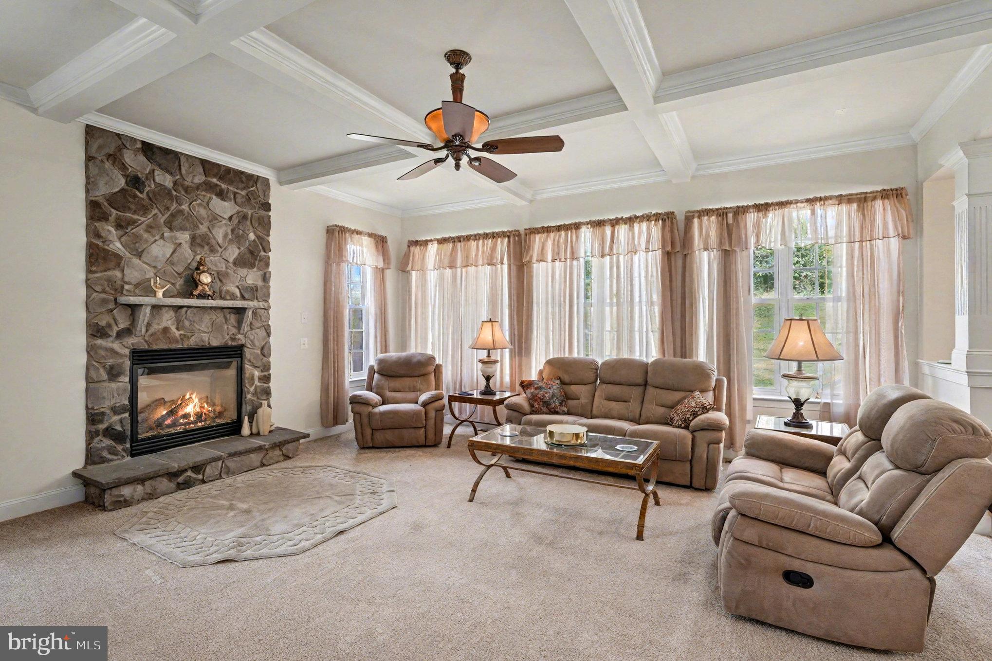 Welcome to the Luxury Single Family Home at Potomac Crest. Built in 2006  Beazer Home Corp. Avery Style home.  Set back in a quiet community, minutes from  I95 or route 1 & Quantico Marine Base. This large home is 5,640 Total Sq. Ft. and is setting on a large .59 Acres of land.  The Home  has a large two story entry with office on left and setting room on the right. Walking straight ahead is the beautiful stair to second floor open hallway, then to back spacious kitchen with dining and large Island eat in,  to right of kitchen is large formal dinning with chair railing and shadow boxing trim and crown molding, plus a nice bay window , over looking the back yard. To the left of the kitchen / Dining is a large family room with Stone Fireplace/Gas log with trim out ceiling. Plus a powder room in the hall to the kitchen & stairs to the basement. The Dining /Kitchen also has laundry rm which leads to the garage entry , plus to the back wall there is a set of doors with panels of glass & transom glass above, which leads to a back deck which is a 12 x12 wooden deck for dining out side or grilling, It truly is a nice set up . Up stairs  off of the open hallway there are two beds room with shared full bath with double sinks and at one end  a large bed room with full bath at the other end is a large Primary Bed room with spacious setting area for couch /TV , refrigerator   to relax before going the large bed room with (Again Large) walk in closet. Then the Primary Bath room , has Linen Closet then and corner soaking tub with a long vanity and sinks on each end, The Toilet has it own room and the walk in large shower with double shower setup for two people no problem. The last but not least is the basement with large Rec Room and full bath, plus an exercise room to the back and storage in the spacious furnace room and in addition is a 6' wide opening with French dr. and steps to the back yard. Easy way to move furniture, exercise equipment and pool table in and out of the basement.