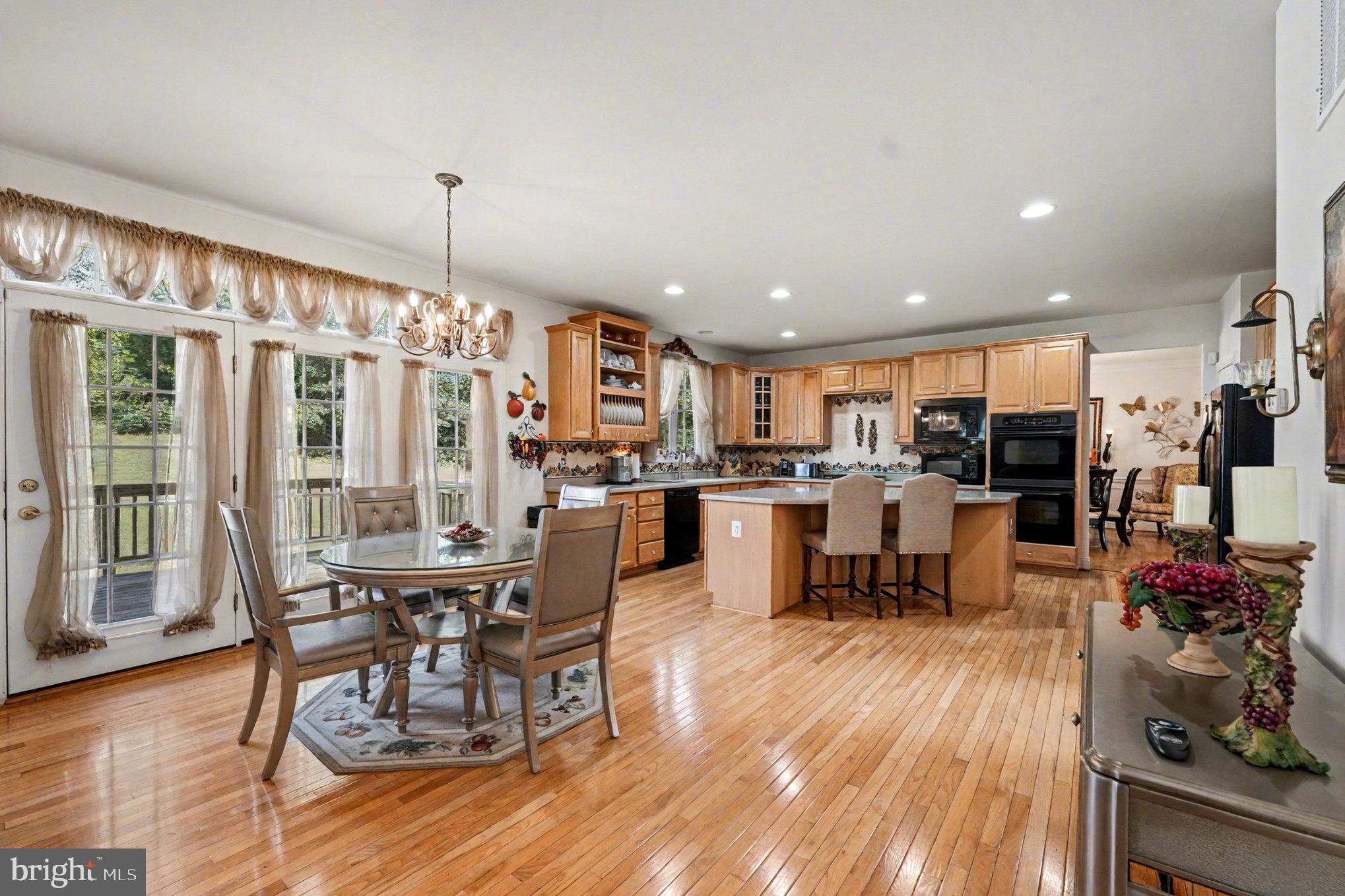 Welcome to the Luxury Single Family Home at Potomac Crest. Built in 2006  Beazer Home Corp. Avery Style home.  Set back in a quiet community, minutes from  I95 or route 1 & Quantico Marine Base. This large home is 5,640 Total Sq. Ft. and is setting on a large .59 Acres of land.  The Home  has a large two story entry with office on left and setting room on the right. Walking straight ahead is the beautiful stair to second floor open hallway, then to back spacious kitchen with dining and large Island eat in,  to right of kitchen is large formal dinning with chair railing and shadow boxing trim and crown molding, plus a nice bay window , over looking the back yard. To the left of the kitchen / Dining is a large family room with Stone Fireplace/Gas log with trim out ceiling. Plus a powder room in the hall to the kitchen & stairs to the basement. The Dining /Kitchen also has laundry rm which leads to the garage entry , plus to the back wall there is a set of doors with panels of glass & transom glass above, which leads to a back deck which is a 12 x12 wooden deck for dining out side or grilling, It truly is a nice set up . Up stairs  off of the open hallway there are two beds room with shared full bath with double sinks and at one end  a large bed room with full bath at the other end is a large Primary Bed room with spacious setting area for couch /TV , refrigerator   to relax before going the large bed room with (Again Large) walk in closet. Then the Primary Bath room , has Linen Closet then and corner soaking tub with a long vanity and sinks on each end, The Toilet has it own room and the walk in large shower with double shower setup for two people no problem. The last but not least is the basement with large Rec Room and full bath, plus an exercise room to the back and storage in the spacious furnace room and in addition is a 6' wide opening with French dr. and steps to the back yard. Easy way to move furniture, exercise equipment and pool table in and out of the basement.
