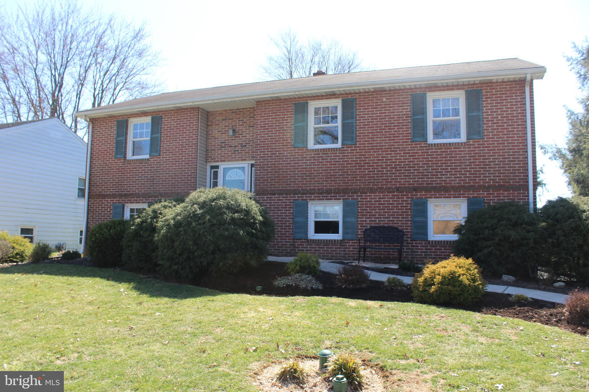 Sweet township home! Nestled peacefully in School Valley Farms walking distance to Manheim Township Schools. Open bright and cheery feel, spacious kitchen and dining area with island, new stove, microwave and dishwasher. This area opens to a superb sun room with a gas stove for coziness in the cooler months. Main floor also boasts of an updated full bath and 3 bedrooms. Lower level has a supersized finished family room and convenient laundry room/mud room off the garage. Enjoy an evening stroll on the sidewalk lines streets, play in the back yard or relax on the deck.