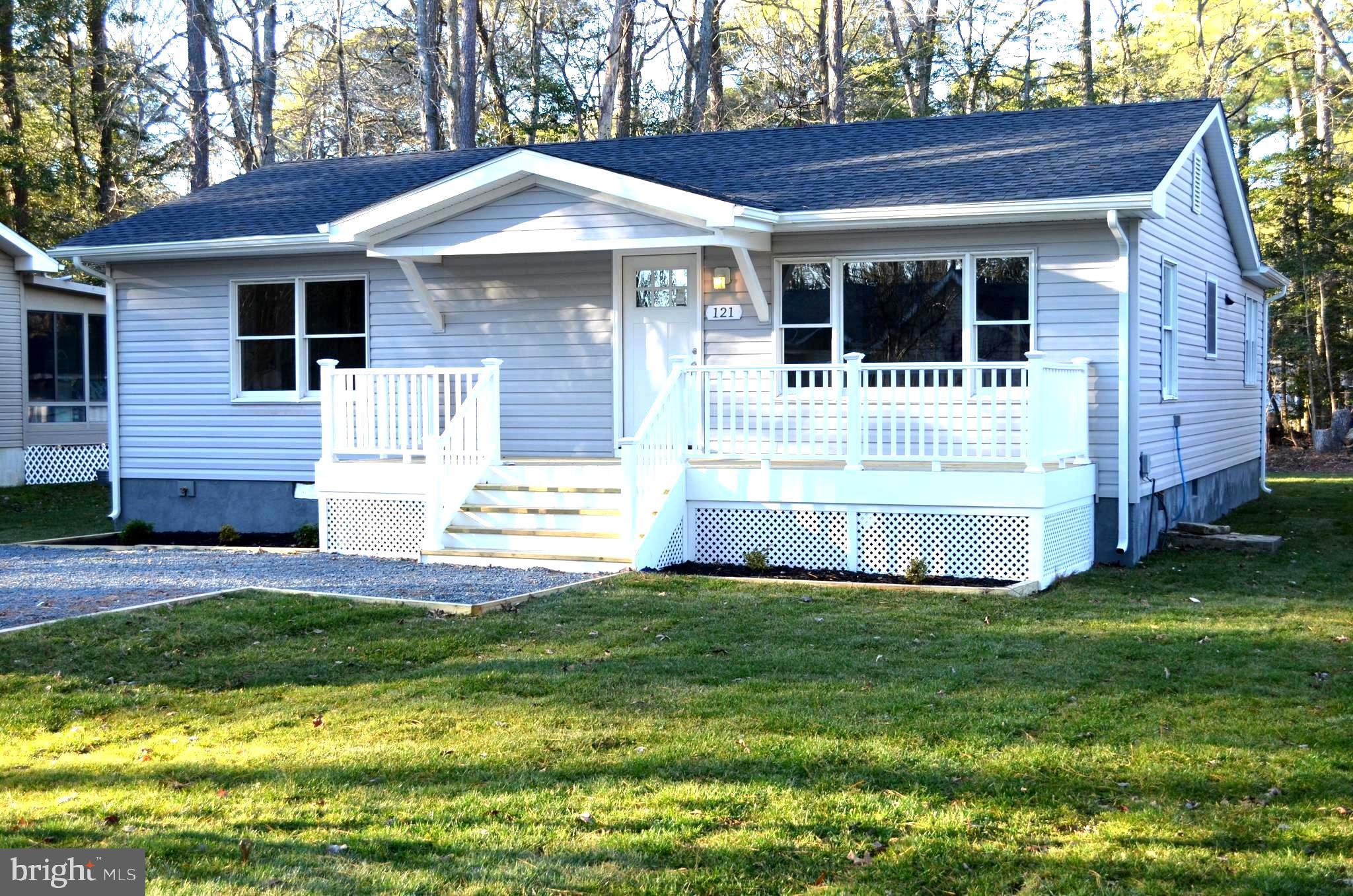 Beautifully renovated ranch style home in active community of Ocean Pines. Home features 3bed/2baths with open floor plan.  Move in ready as the following features are all brand new: Roof, siding, gutters, hot water heater, HVAC units, decking, gravel drive and fresh landscaping. The kitchen and baths have been completely remodeled and include new appliances, cabinetry, lighting, fixtures, and hardware. Home has been freshly painted and includes all new flooring. Separate laundry area/pantry off kitchen along with additional attic storage. Enjoy outdoor entertaining as this home features both front and back decks. Spacious yard and shed with electric for additional storage. Located minutes from Maryland Beaches with an array of community amenities including multiple pools, community center, marina, boat ramp, club house, basketball, volleyball, tennis and golf with membership. New Plat estimates interior Total SQFT as 1214. Tax record has not been adjusted accordingly. Whether a home year round or a seasonal retreat, this home defines Coastal Living at its finest!