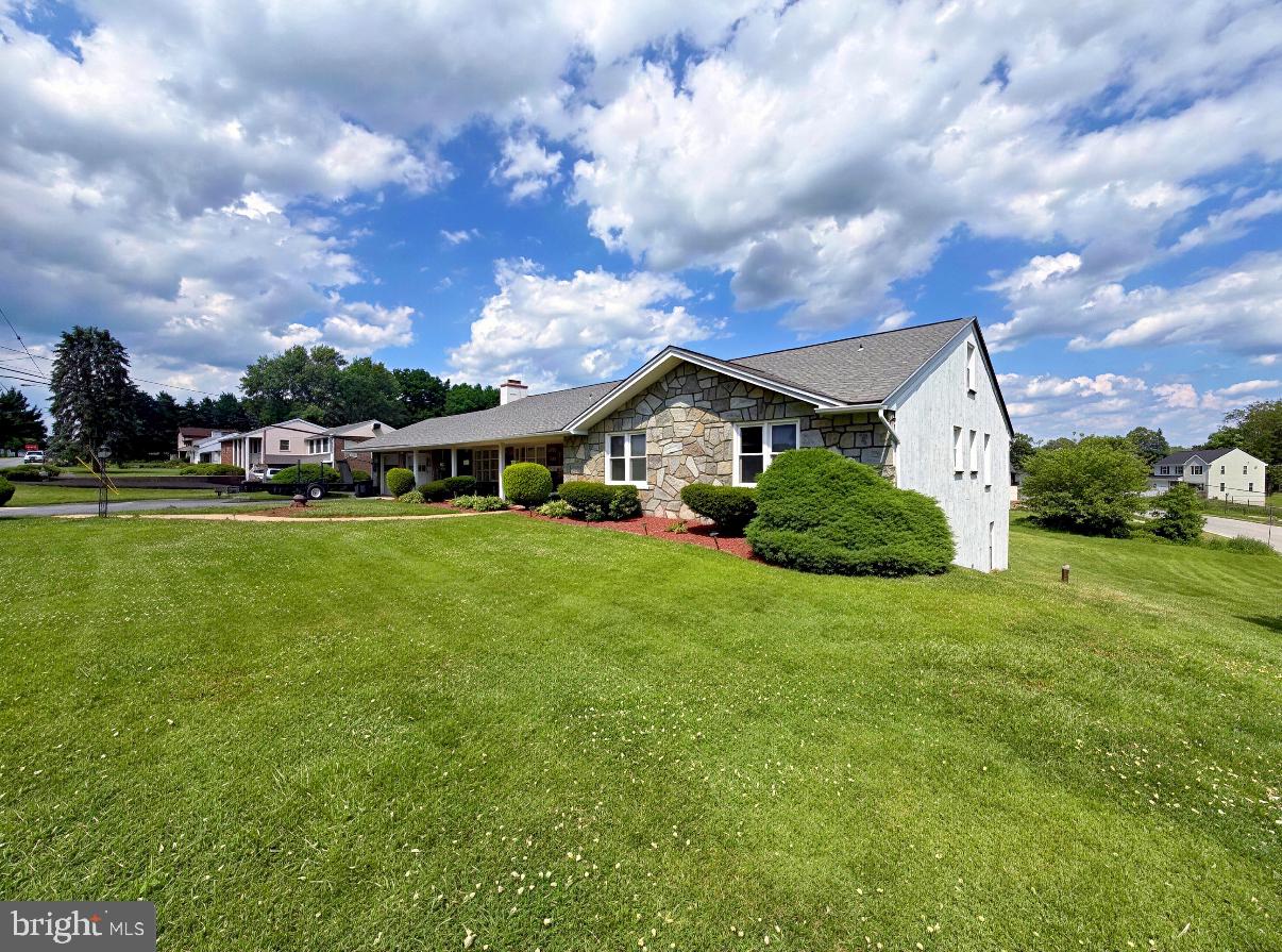 New opportunity in Valley Township in South Coatesville, Pennsylvania! A classic rancher with great bones and incredible potential. This four-bedroom, two full/two half bath home sits on approximately .7 acres with a mostly flat backyard featuring a nicely maintained inground pool, perfect for entertaining or simply enjoying your own private outdoor retreat!  Inside you’ll find four spacious, well-maintained bedrooms, all with a comfortable, lived-in feel. The full unfinished basement is an open canvas ready for your vision as it already includes a bar area, an unutilized full bath with standing shower, and an egress door that walks right out to the backyard, making it an ideal candidate for finishing as a family room, in-law suite, or whatever fits your lifestyle. The home has been genuinely cared for over the years; structurally solid, good foundation, good bones. If you’re looking to add your own personal touch cosmetically or aesthetically, this is the perfect opportunity to build real equity in a home that already works. Don’t miss your chance to make this one yours! Reach out today for more details or to schedule a private showing.