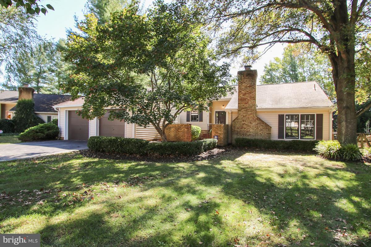 This lovely home is move in ready! Freshly painted with new carpets. Hardwood floors in the living room and dining room. Open floor plan and large rooms great for entertaining with a  wood burning fireplace.  Updated bathrooms and kitchen, walk out basement with lots of sunlight. Two car garage and large fenced back yard. Located in a quiet cul de sac! Don't miss this spacious turnkey home!