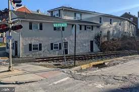 2nd Floor two  bedroom apartment available in downtown Oxford. Eat in kitchen. Living room. Spacious bedroom. Full tile bathroom. Vinyl plank floors throughout. Pets on case by case bases. Application and credit check required. No smoking. Tenant pays electric, cable/internet and water/sewer. Trash, lawn and snow are included.