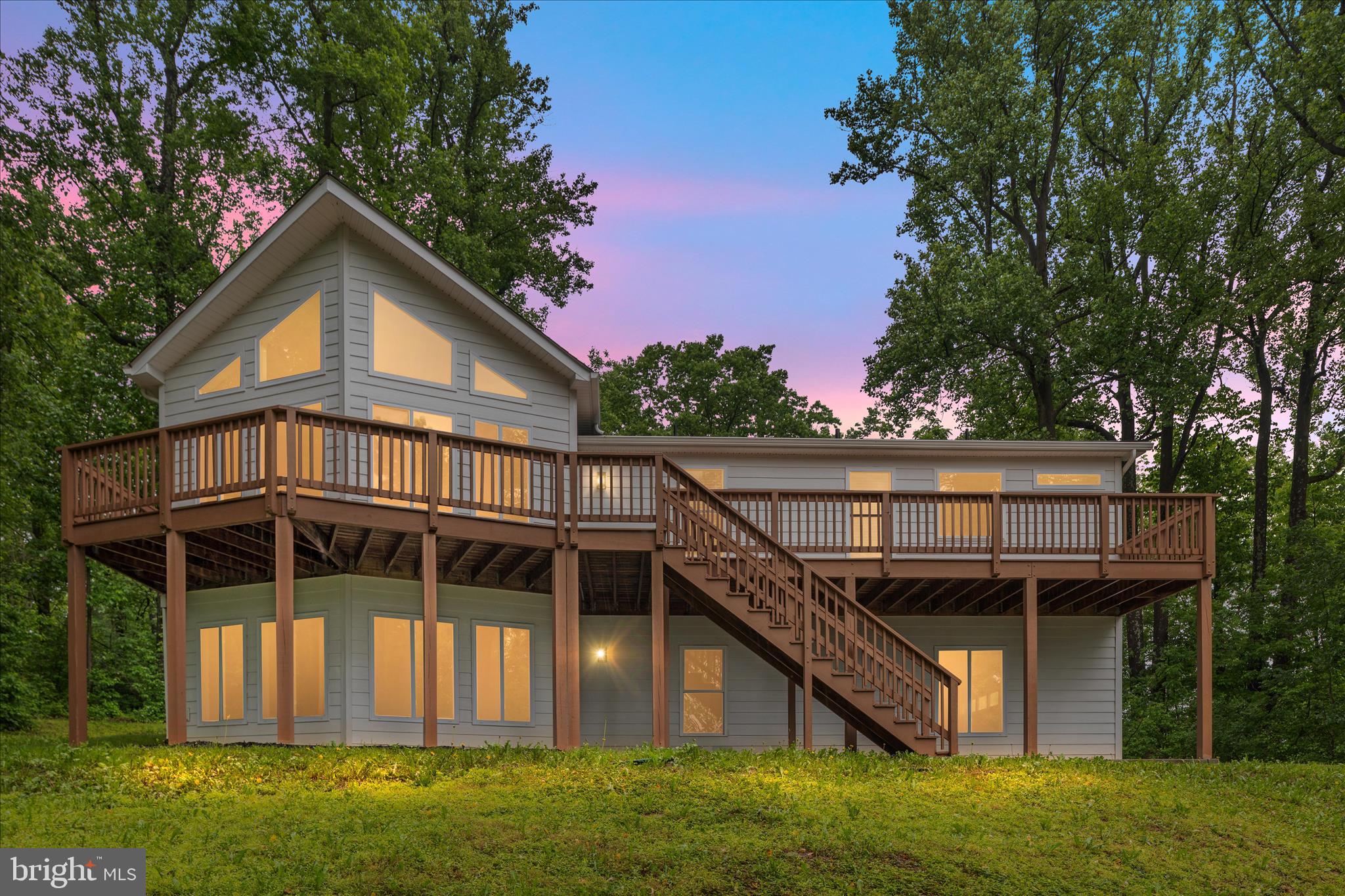 Better than new construction! Plus 5% assumable VA loan$$ Tucked away in a peaceful, secluded setting, this open, bright, and serene 4-bedroom, 3-bath home is surrounded by stunning mountain and tree-lined views, offering the perfect blend of privacy and natural beauty—just a short drive to Shenandoah National Park, Main Street, and The Inn at Little Washington. The upper level features a spacious primary suite with private bath, along with two additional bedrooms and a full hall bath, while the walk-out basement includes a fourth bedroom and full bath—ideal for guests or flexible living.

The heart of the home is the light-filled living area, where large rear-facing windows perfectly frame the breathtaking mountain and wooded views. Enjoy relaxing or entertaining on the back deck, soaking in the peaceful surroundings and vibrant seasonal changes—especially in the fall when the foliage is at its peak. The walk-out basement provides convenient access to the garage and backyard space.

Located in a quiet, friendly community with no formal HOA, residents enjoy access to private lakes and a boat landing, adding to the outdoor lifestyle this property offers. With its combination of scenic beauty, privacy, and convenience, this home is a true retreat while still being within reach of town amenities.
Interior photos coming 5/27